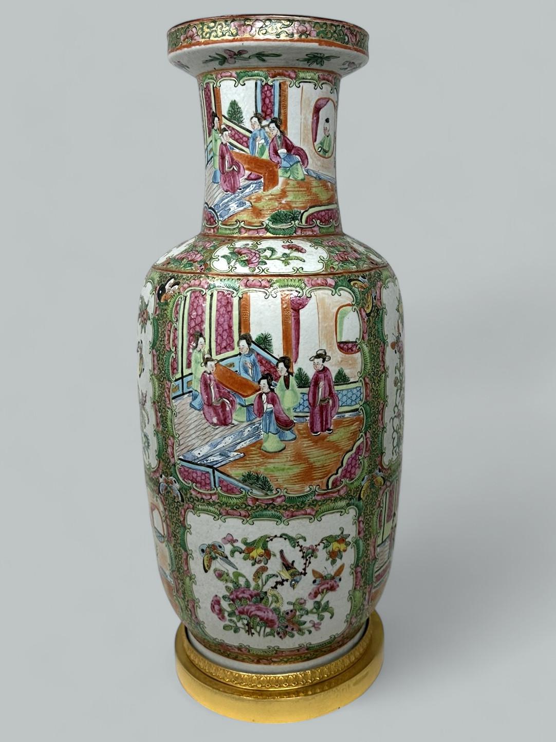 Stunning and very large Chinese Canton famille verte ormolu mounted porcelain vase of museum quality, from the city of Canton, is decorated in the so-called Famille Verte manner, mid Nineteenth Century. 

Wherein the primary colour tones adorning