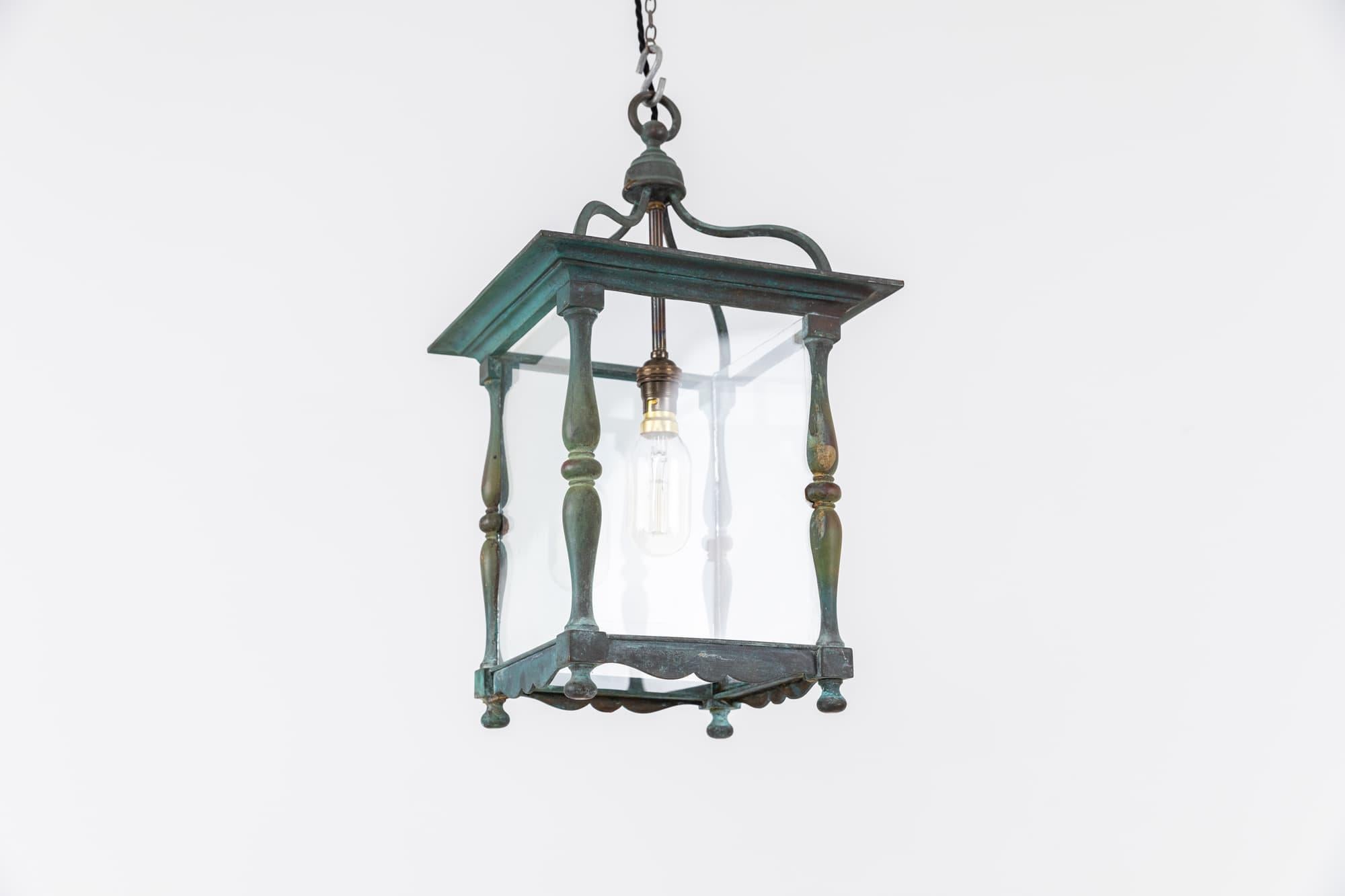 

A beautifully formed cast brass porch lantern made by Faraday & Sons. c.1920

A heavy duty, high quality lantern, cast from brass which has built up a wonderful patina. Glazed panels all intact. Stamped F&S to hanging loop.

Rewired with 1m of