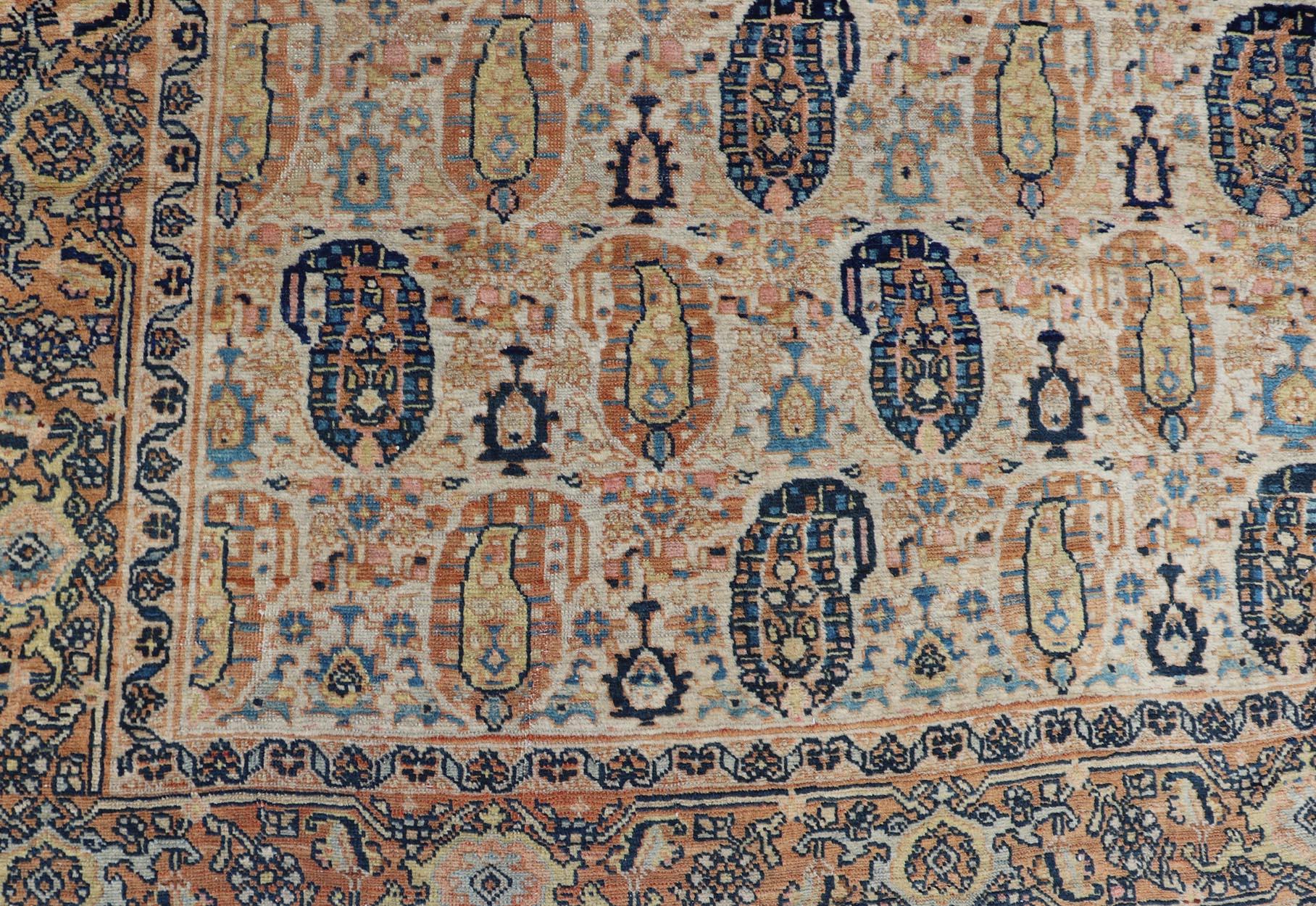 Hand-Knotted Antique Feraghan Persian Rug in Cream Color Background with Paisley Design For Sale