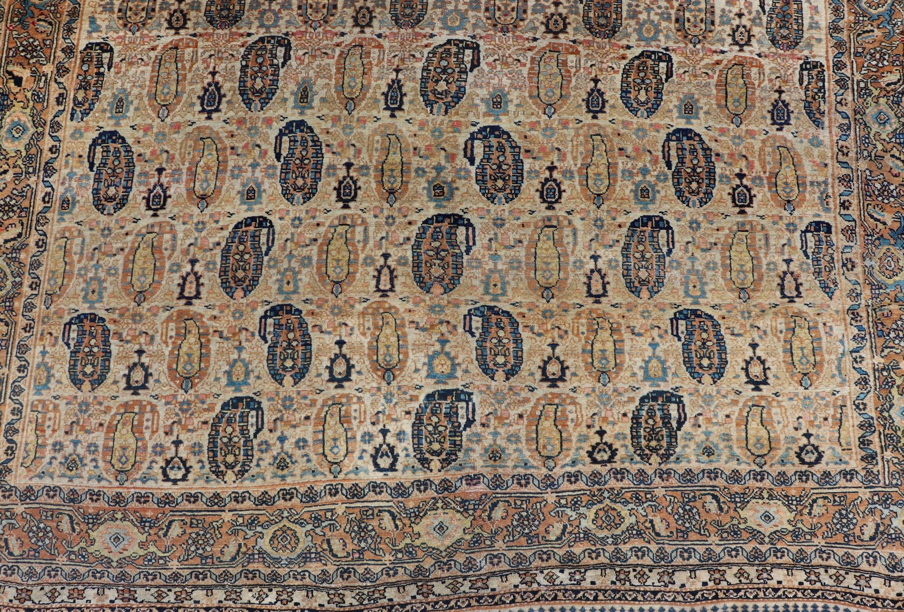 Antique Feraghan Persian Rug in Cream Color Background with Paisley Design In Good Condition For Sale In Atlanta, GA