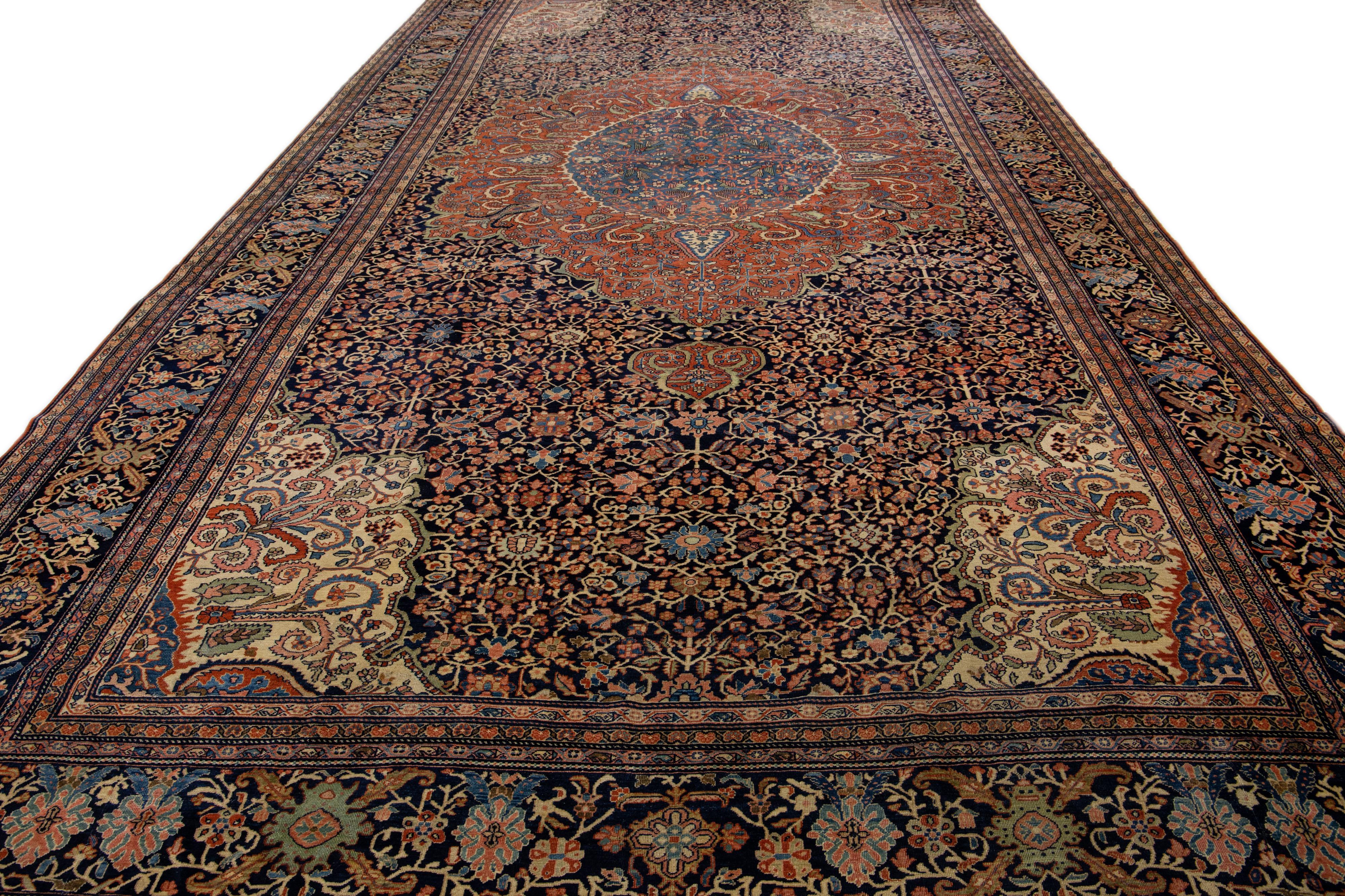 Sarouk Farahan Antique Farahan Handmade Blue & Rust Persian Wool Rug With Rosette Motif For Sale