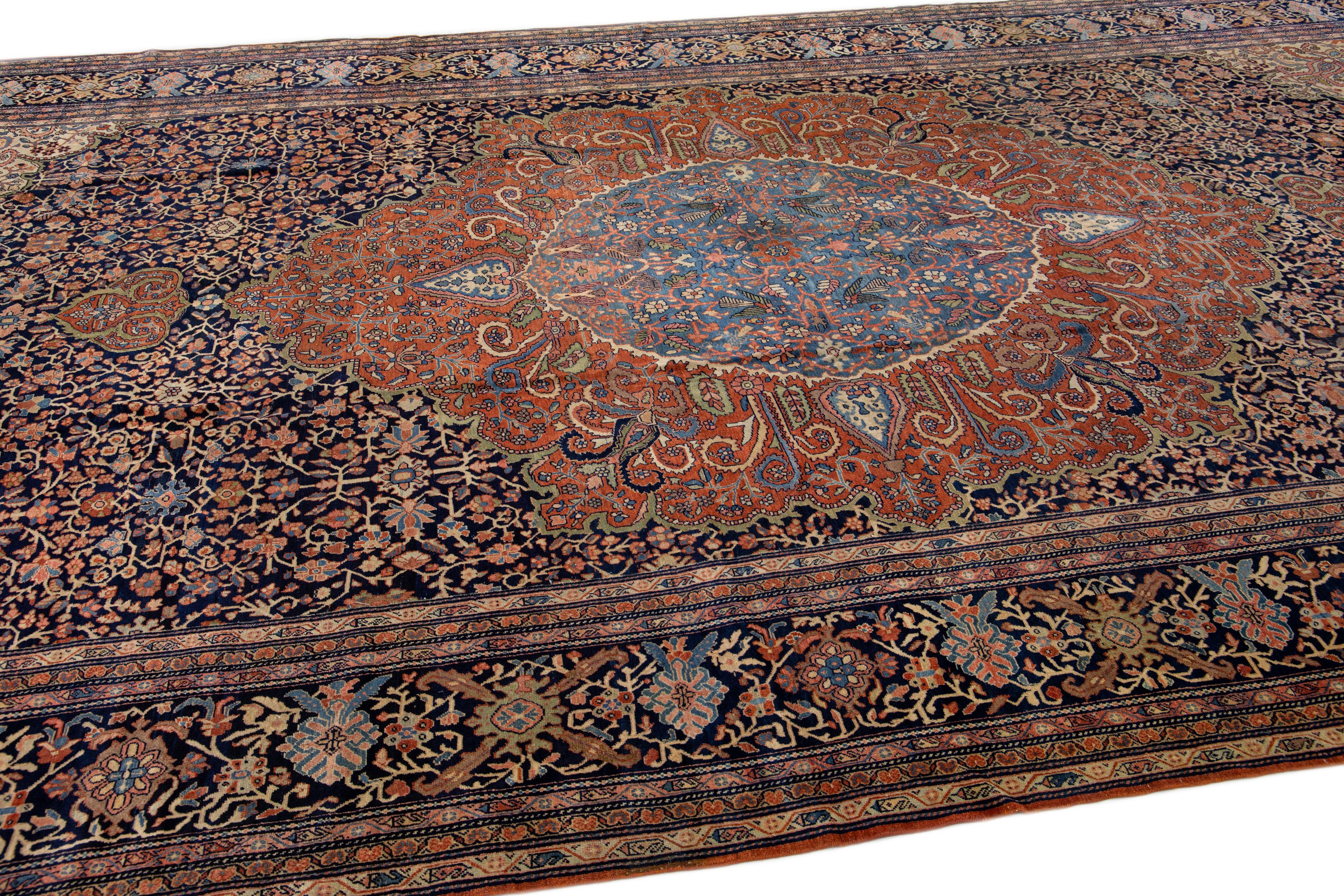 20th Century Antique Farahan Handmade Blue & Rust Persian Wool Rug With Rosette Motif For Sale