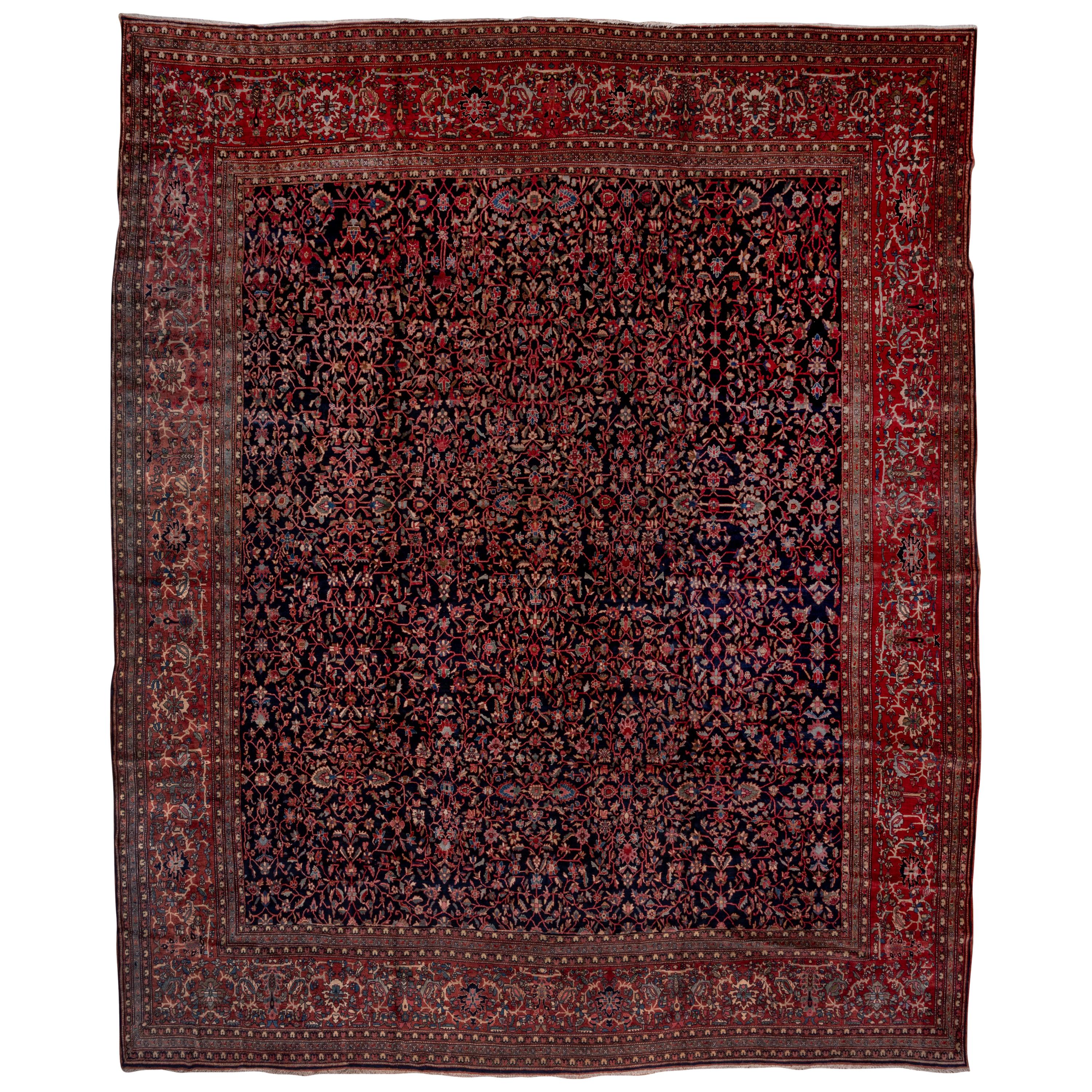 Antique Farahan Sarouk Carpet, Dark Rich Colors, Navy All-Over Field Red Borders For Sale