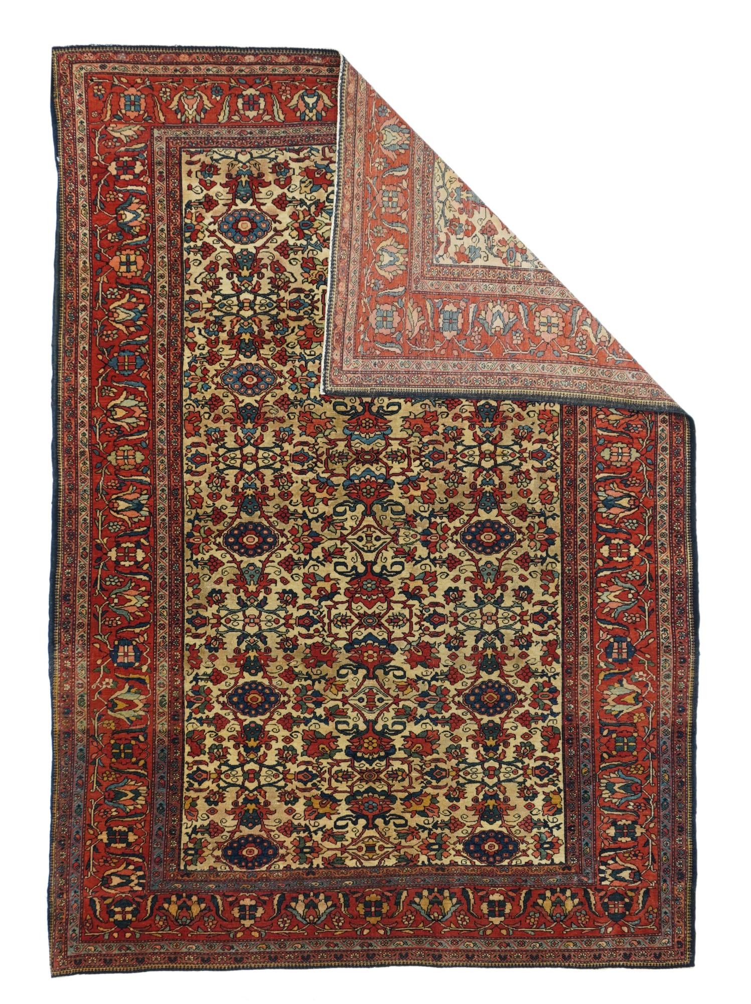This west Persian village scatter with a robust handle on cotton foundation shows a moderately elaborate, smaller scale allover Herati design on ecru, within a red border of inward-facing palmettes alternating with crosses within elongated rosettes.