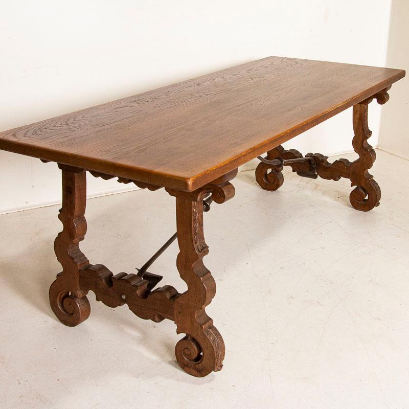 Antique Farm House Dining Table with Carved Legs and Iron Stretcher In Good Condition In Round Top, TX