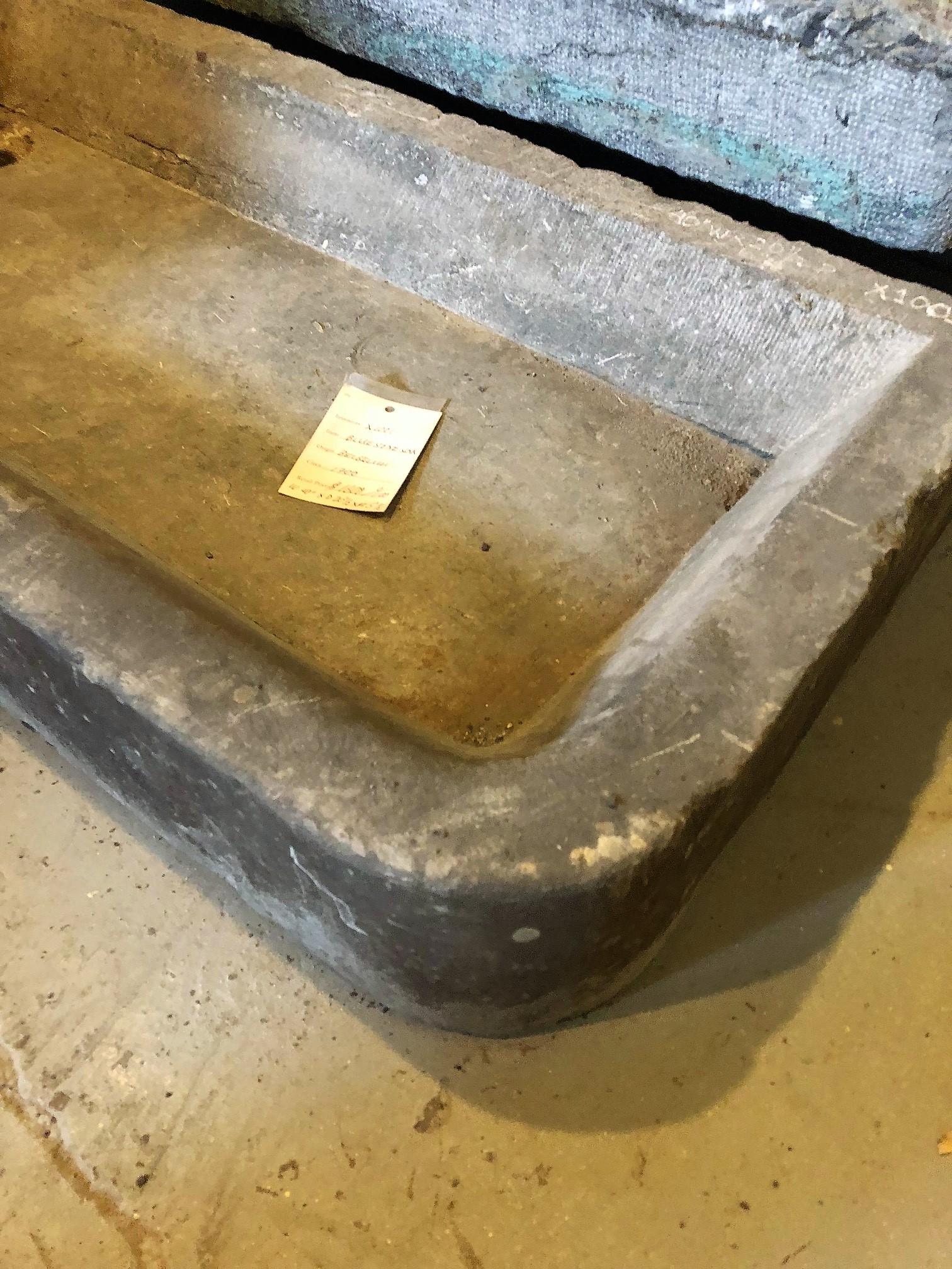 Antique trapezoid shaped farm sink imported from Switzerland.

circa 1820

Measurements: 
Front - 45 1/2