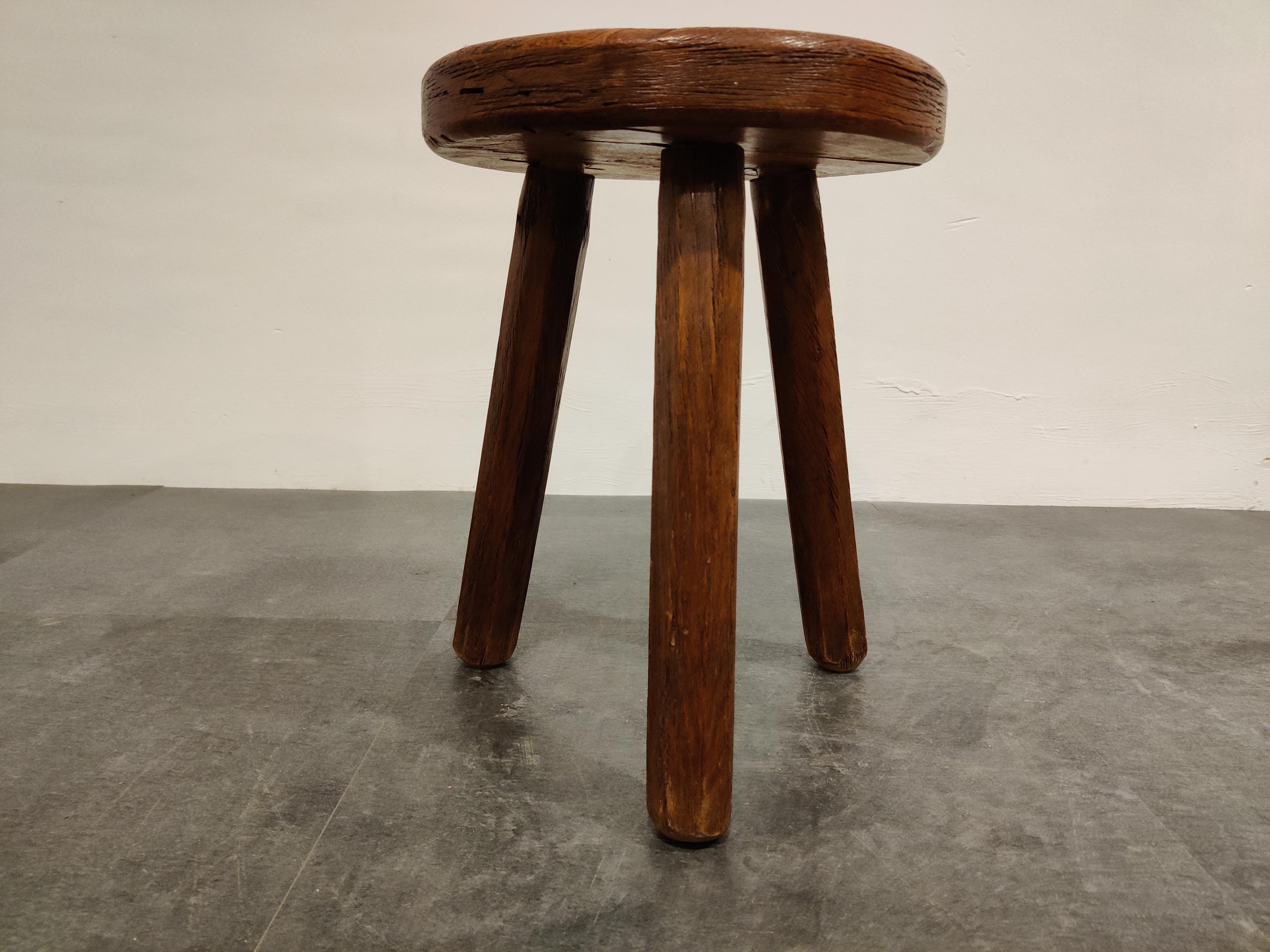 Primitive handmade tripod base farm stool

Timeless, decorative piece

1950s - France

Good condition

Dimensions:
Height: 42cm
Diameter: 30cm

Ref.: 90125