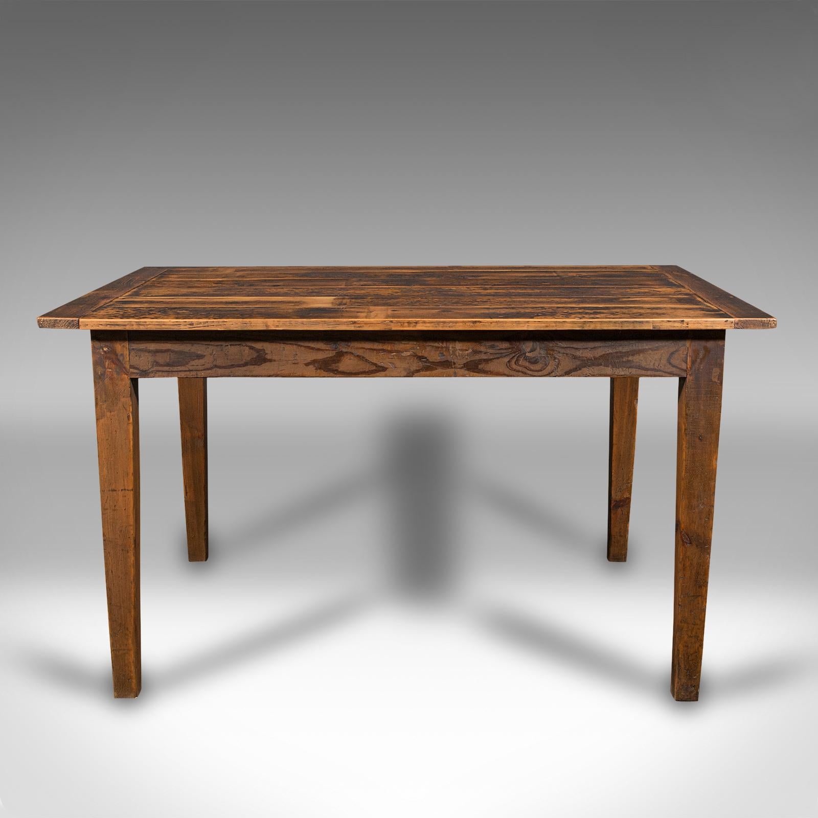 This is an antique farmhouse kitchen table. An English, pine country dining table, dating to the late Victorian period, circa 1900 and later.

Compact of proportion, suitable for seating four comfortably
Displays a desirable aged patina