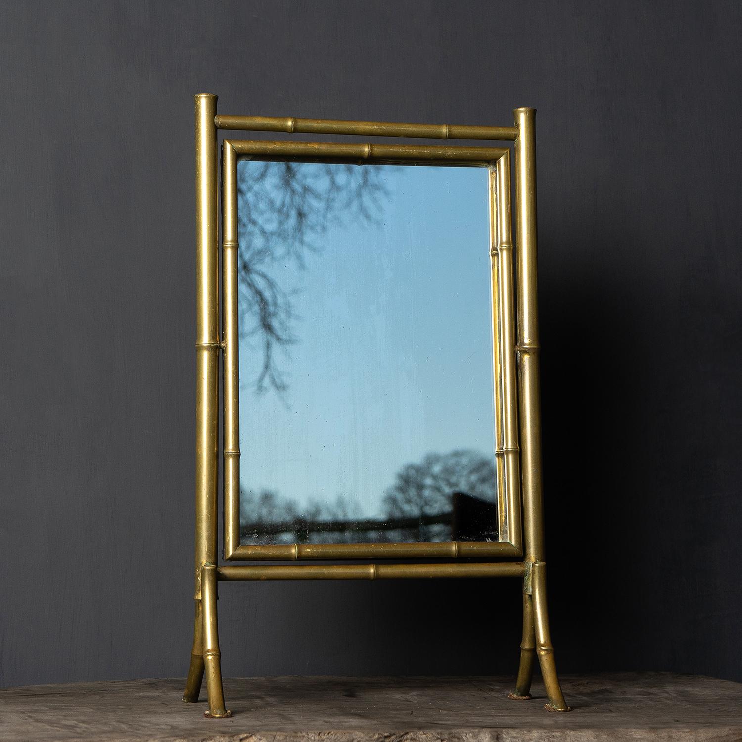 ANTIQUE EASEL TABLE TOP MIRROR
Simple and elegant naturalistic frame in the form of bamboo.

Dating from the late Victorian/Edwardian period.

It is in very good vintage condition with only minor wear commensurate with age

Measuring 52cm high x