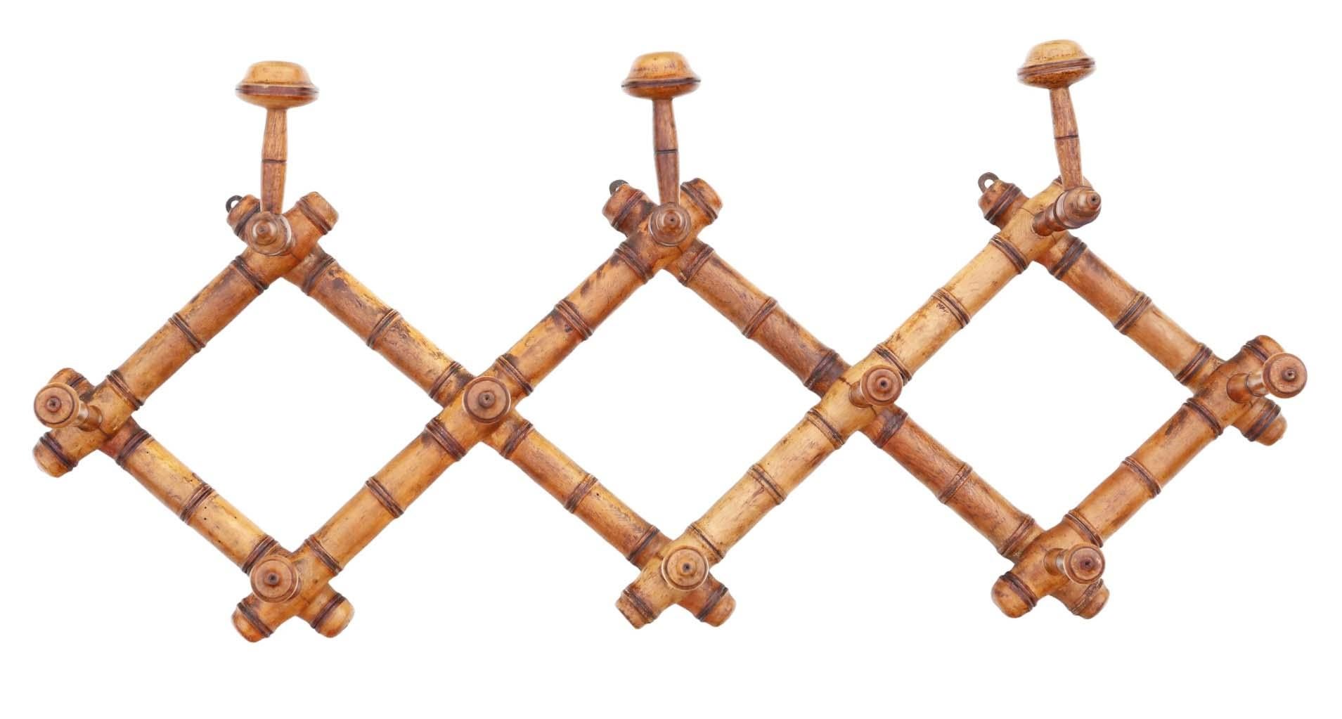 Antique Faux Bamboo Wall Mounted Hall Coat/Hat Stand - High-Quality Vintage Piece from Circa 1900.

Exceptional age, color, and patina make this a rare decorative find. Folding for easy transport.

This piece exhibits no loose joints or