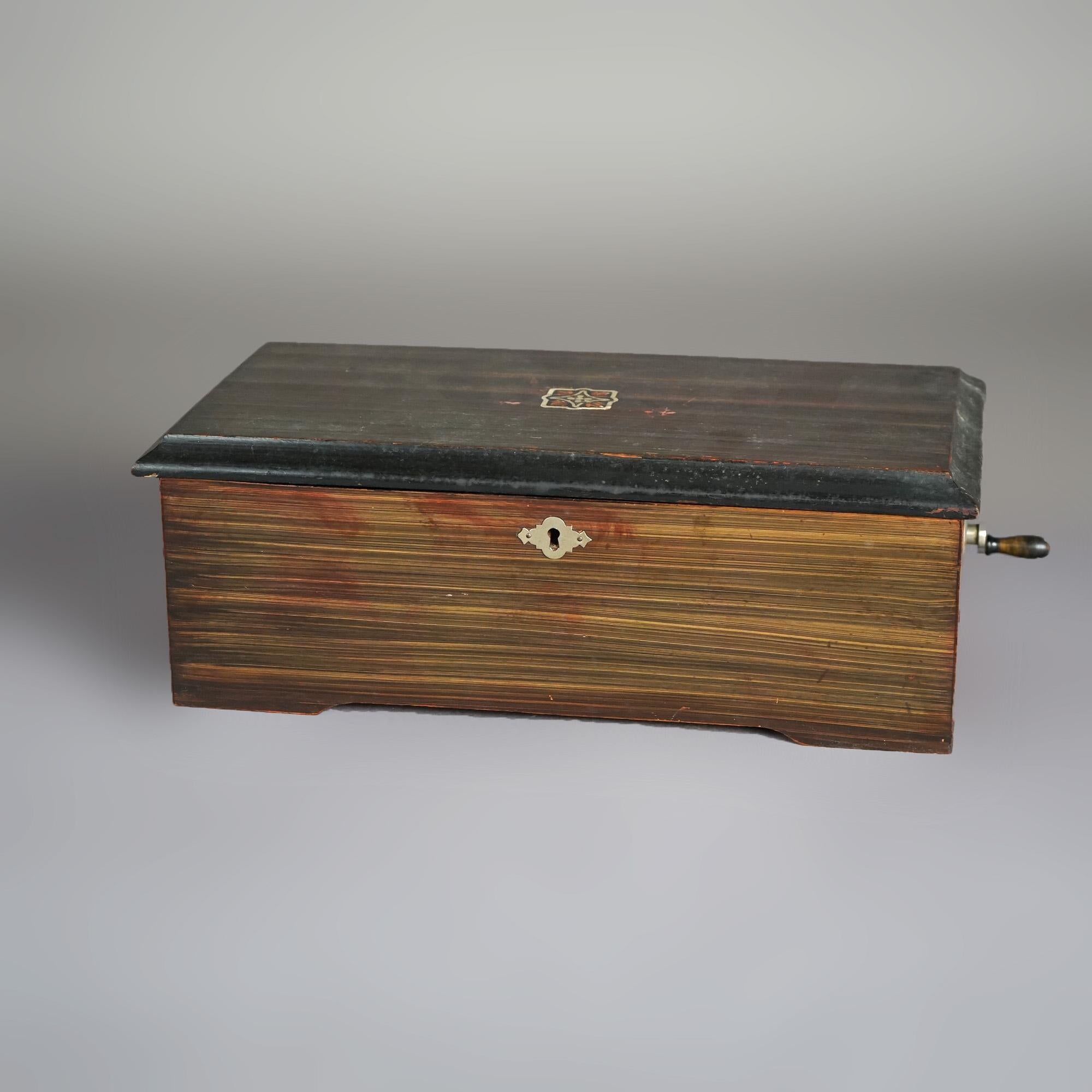 Antique Faux Grain Painted Swiss Six-Tune Music Box with Crank & Tune Card Circa 1890

Measures - 4.75