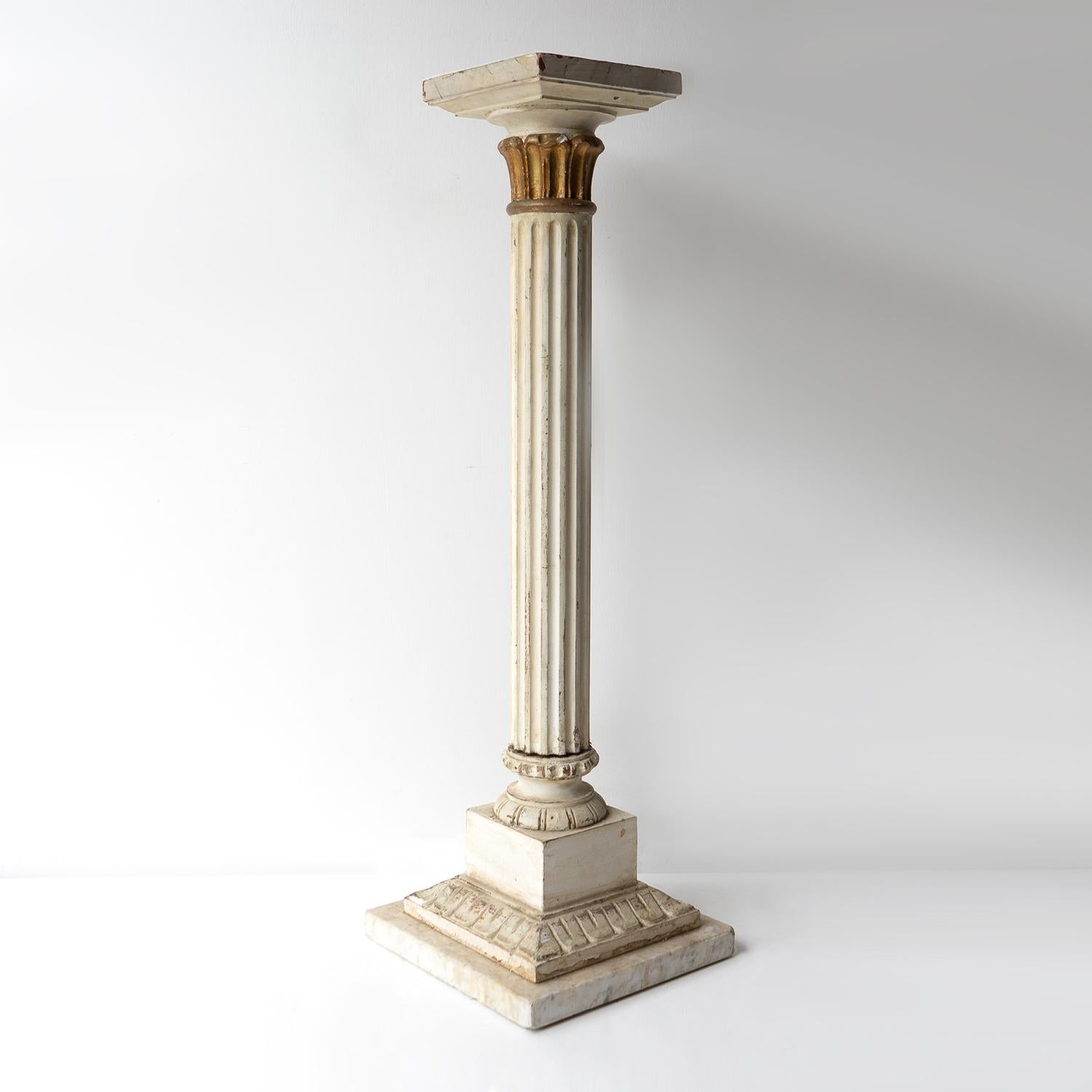 ANTIQUE PEDESTAL, 19th Century

Decorative parcel-gilt and simulated marble stand in the form of a Corinthian column with a fluted shaft.
Made from painted wood and plaster with a genuine marble base providing weight.
It is in very good vintage