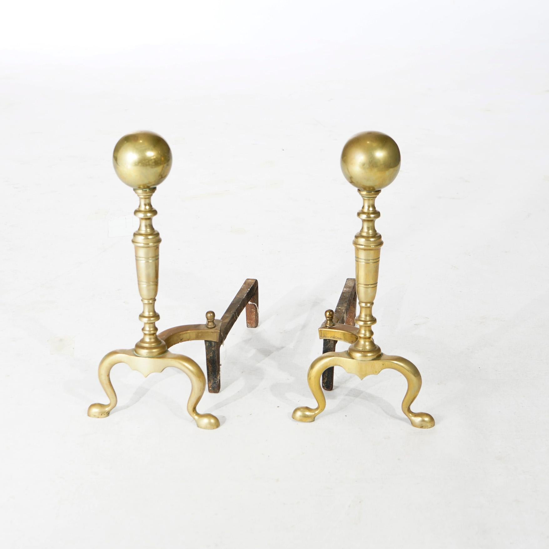 An antique pair of Federal fireplace andirons offer brass balustrade columns with oversized ball finials over cabriole legs and wrought iron firedogs, 19th century.

Measures- 16.5''H x 8''W x 16''D.
 
Catalogue Note: Ask about DISCOUNTED DELIVERY