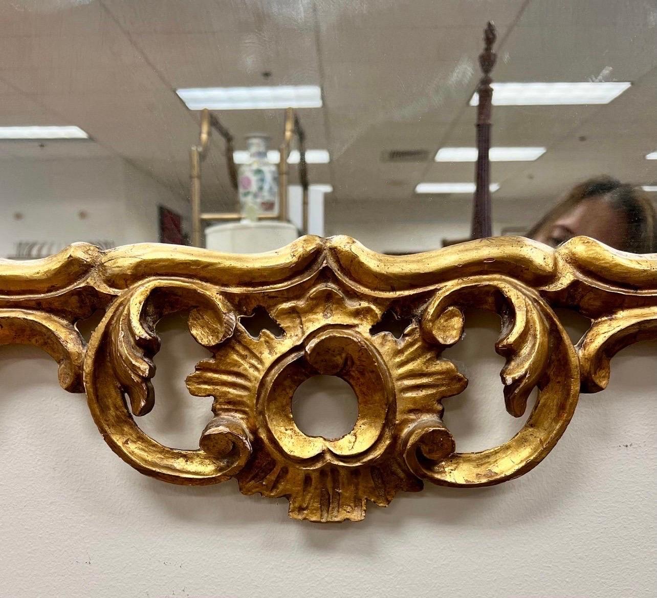 antique mirror with eagle on top