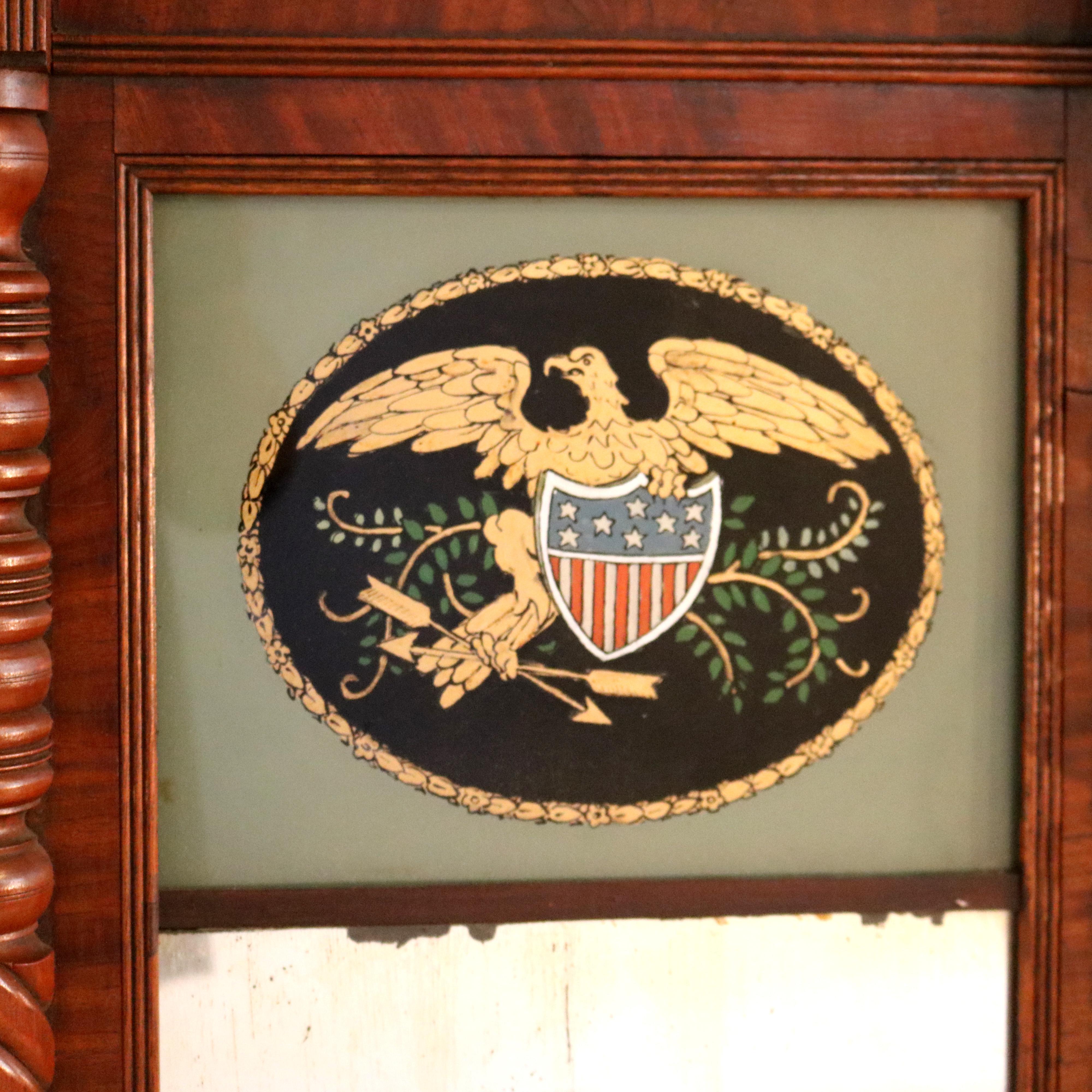 Antique Federal Flame Mahogany Mirror with Eagle & Shield Decorated Englomise Panel and Rope Twist Balustrade Form Frame,  c1830

Measures - 14