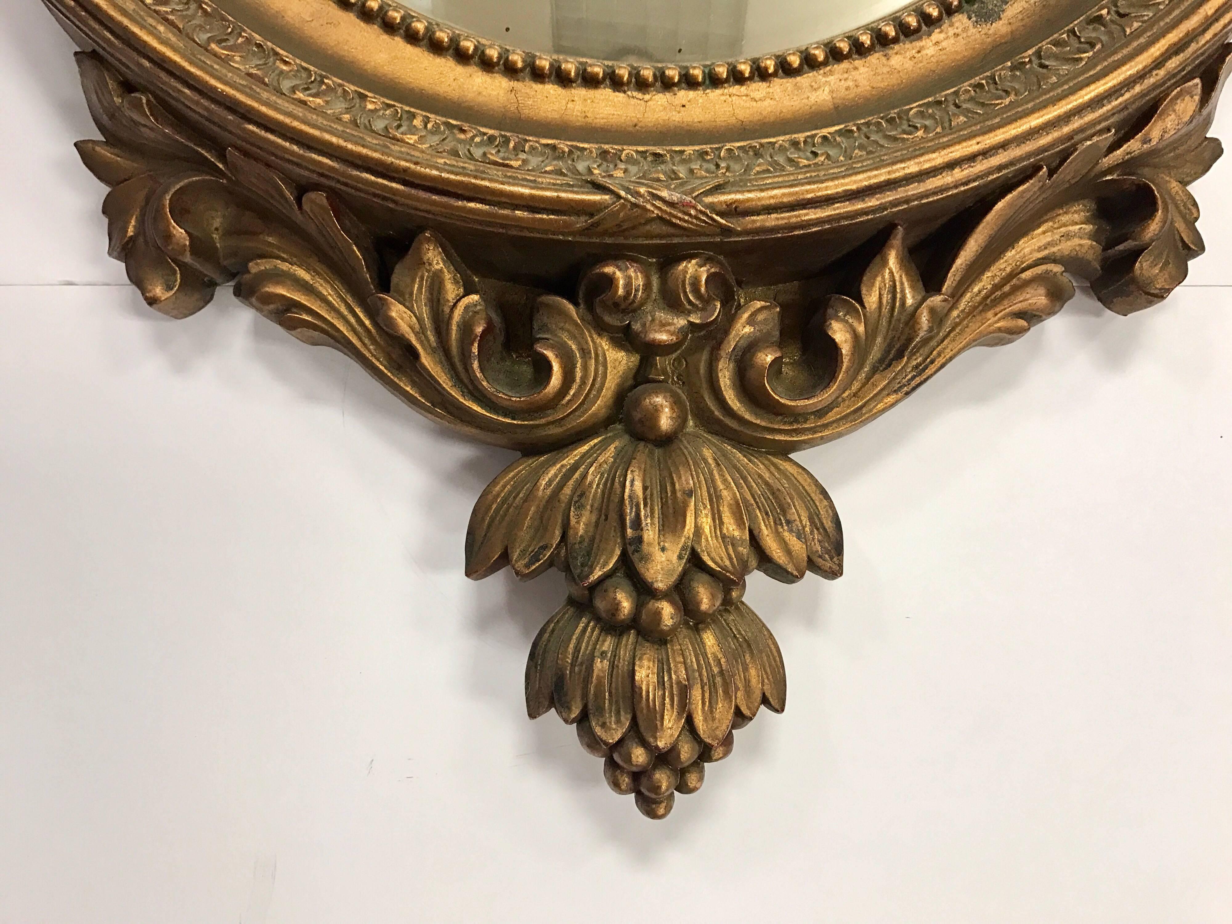 antique convex mirror with eagle