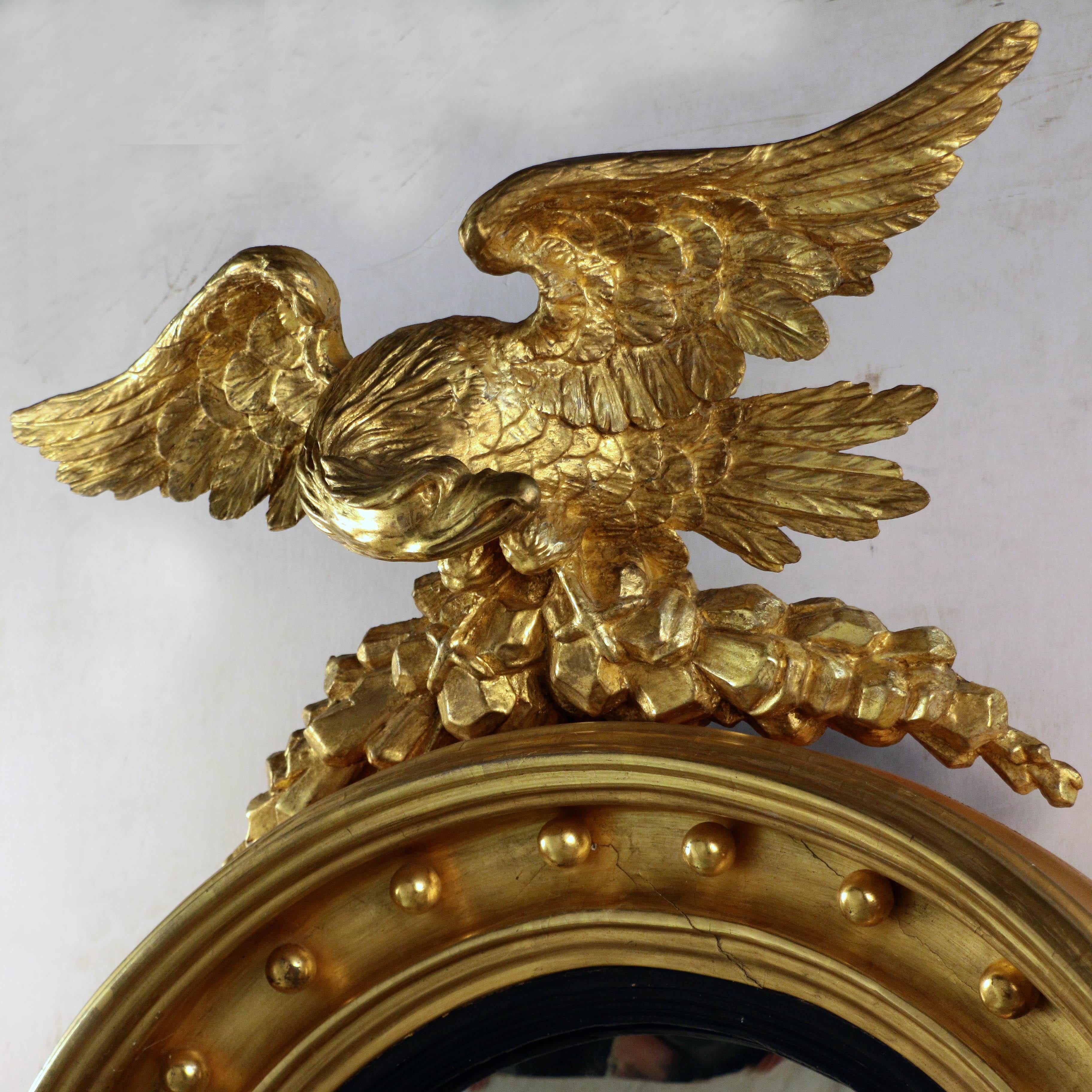 antique federal eagle gold giltwood frame with convex mirror