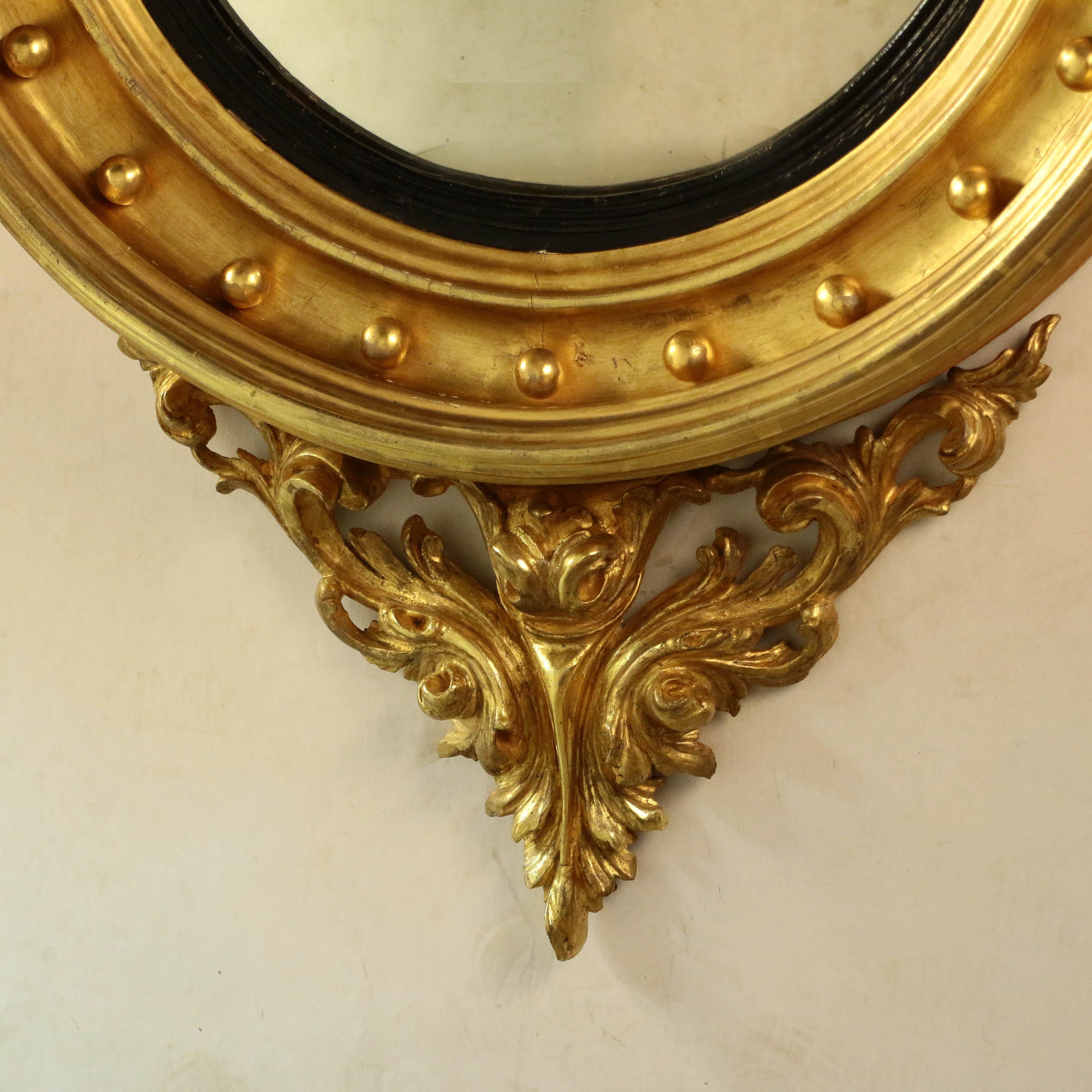 Hand-Carved Antique Federal Giltwood Convex Mirror with Eagle Crest