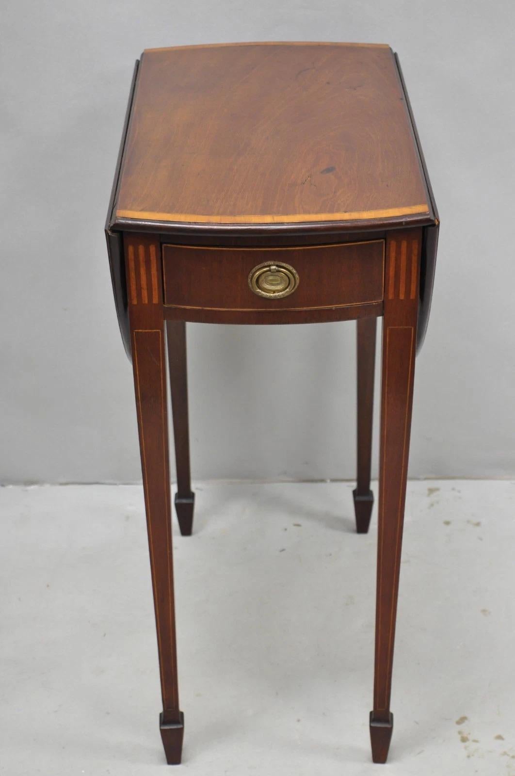 Please message us with your zip code to request a more reasonable domestic U.S. shipping quote.

Antique Federal Mahogany Satinwood Inlay Narrow Dropleaf Pembroke Side Table with Single Hand Dovetailed Drawer. Circa Late 19th Century. Measurements: