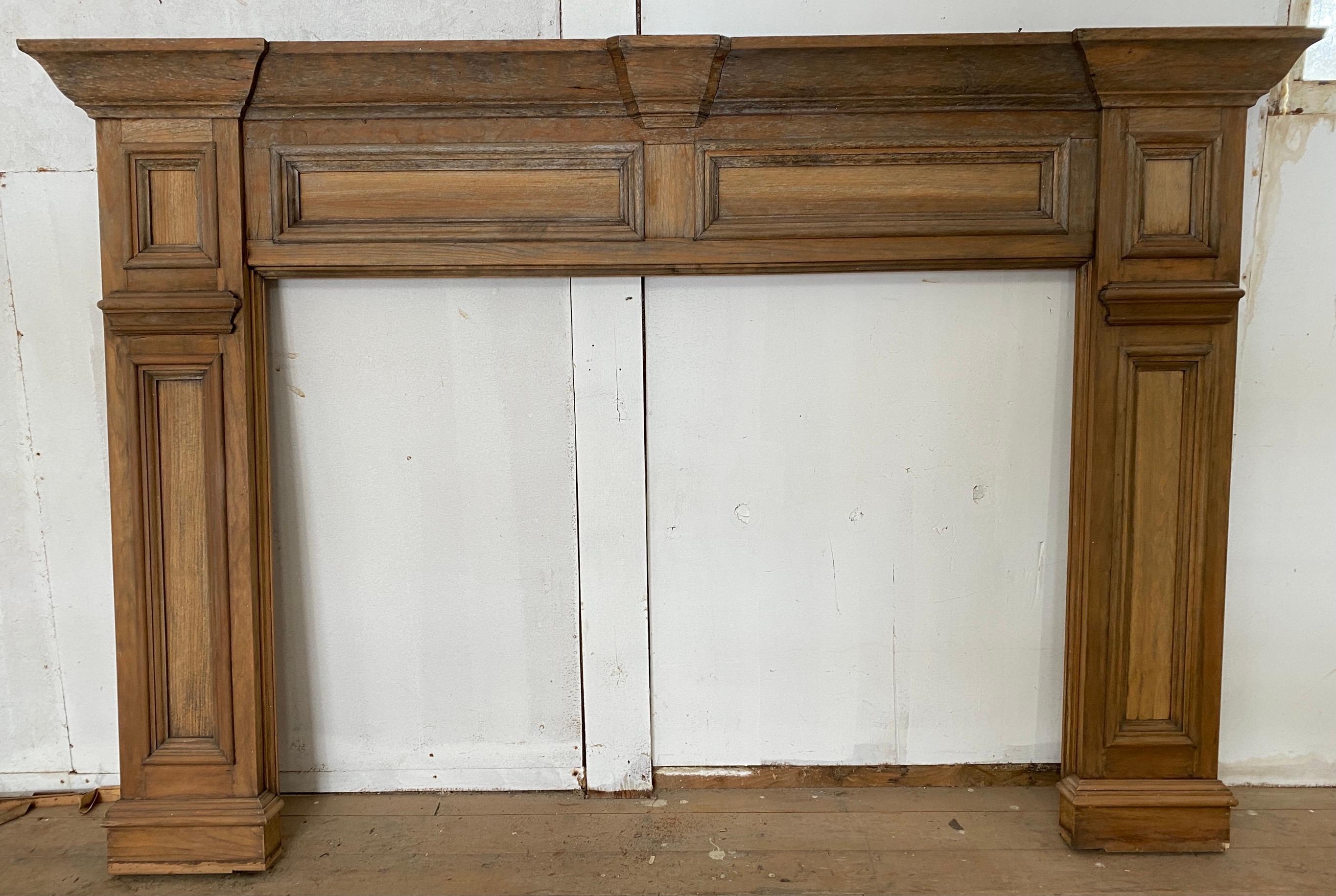 A handsome example of an unusually large American Federal Period wooden fireplace mantel. The wood does show aged wear. Use it as is for added character or refinish for a more finished look.
Inside opening: 59