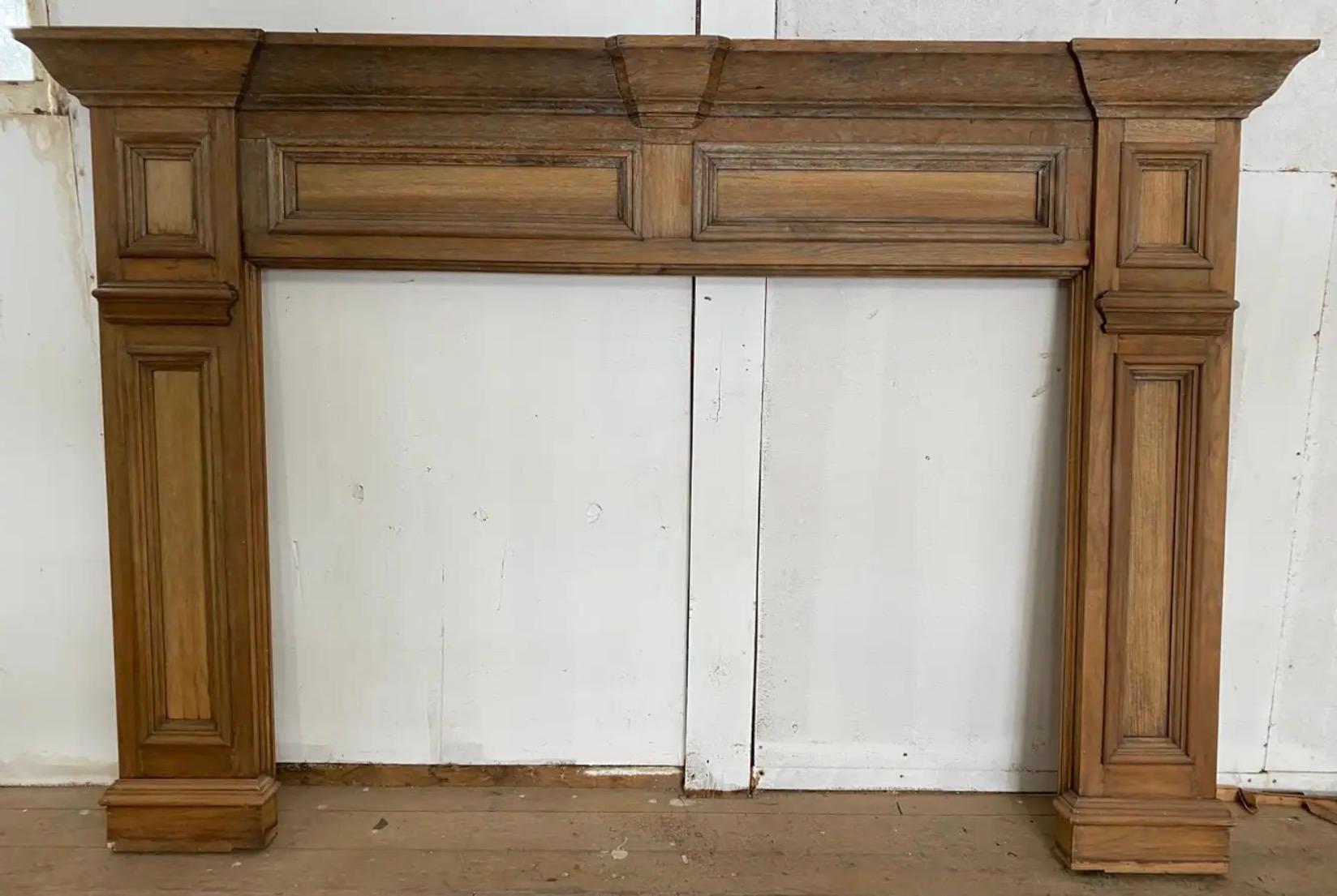 A handsome example of an unusually large American Federal Period wooden fireplace mantel. The wood does show aged wear. Use it as is for added character or refinish for a more finished look. Inside opening: 59