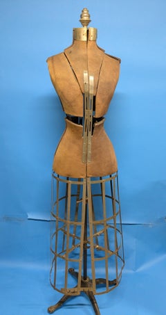 Antique female adjustable cage dress form mannequin