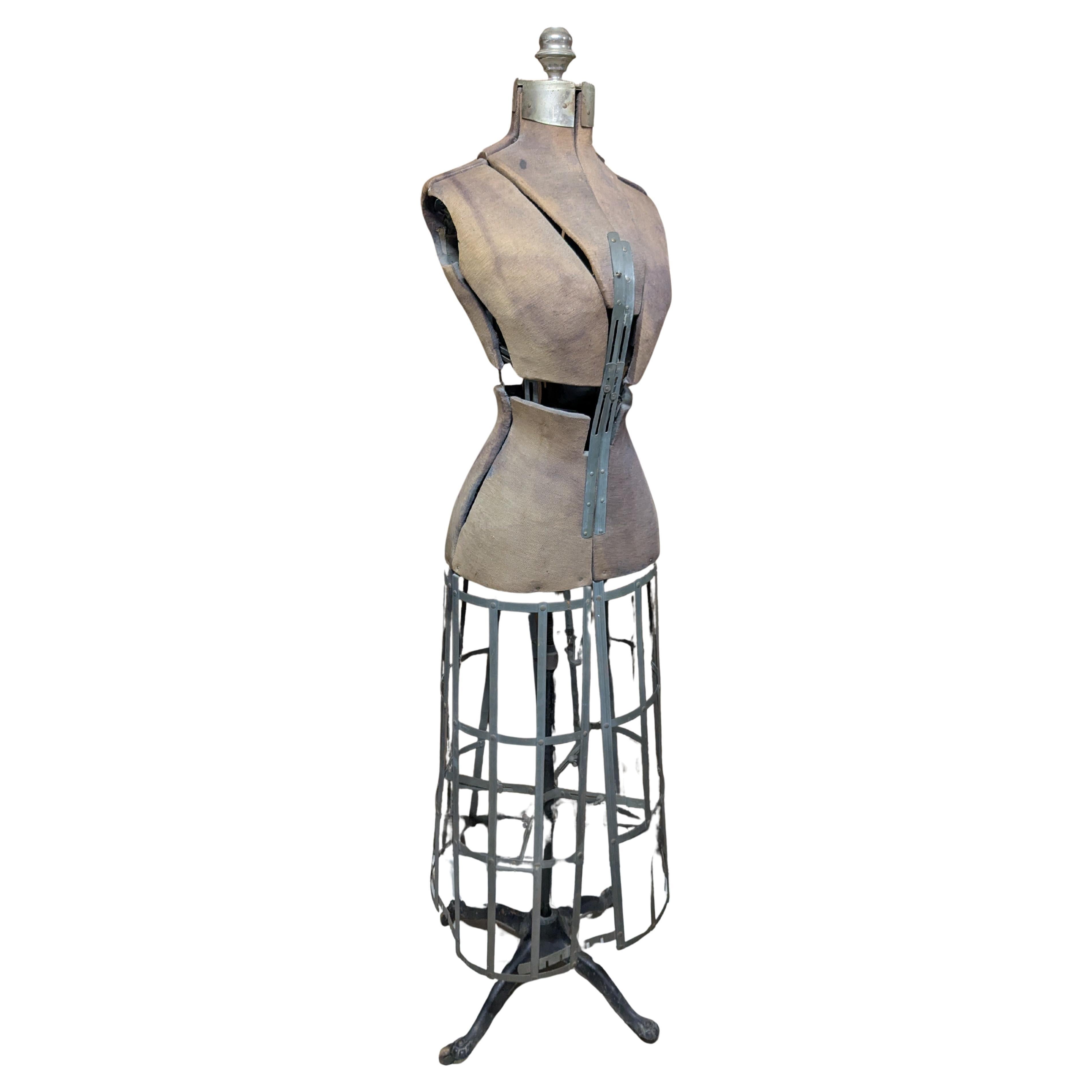 Antique female adjustable cage dress form mannequin