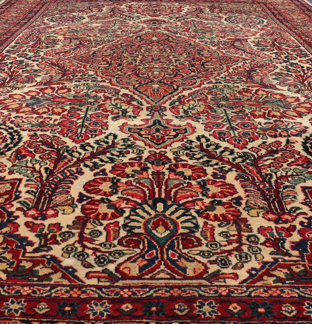 20th Century Antique Feraghan Sarouk Fine Persian Rug in Ivory Background & Intricate Design For Sale