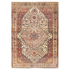 Antique Feraghan Sarouk Rug in Ivory Background, Brown Red, Camel, and Teal