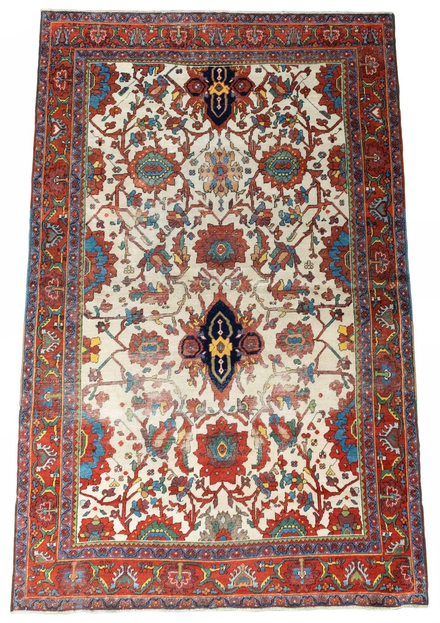 A stunning antique Ferahan rug, hand woven circa 1880 with a stylised floral design on a rare ivory field and terracotta border. A bit of wear but I fell in love with those awesome vegetable dyes.
Size: 1.97m x 1.24m (6ft 6in x 4ft 1in)
This rug has