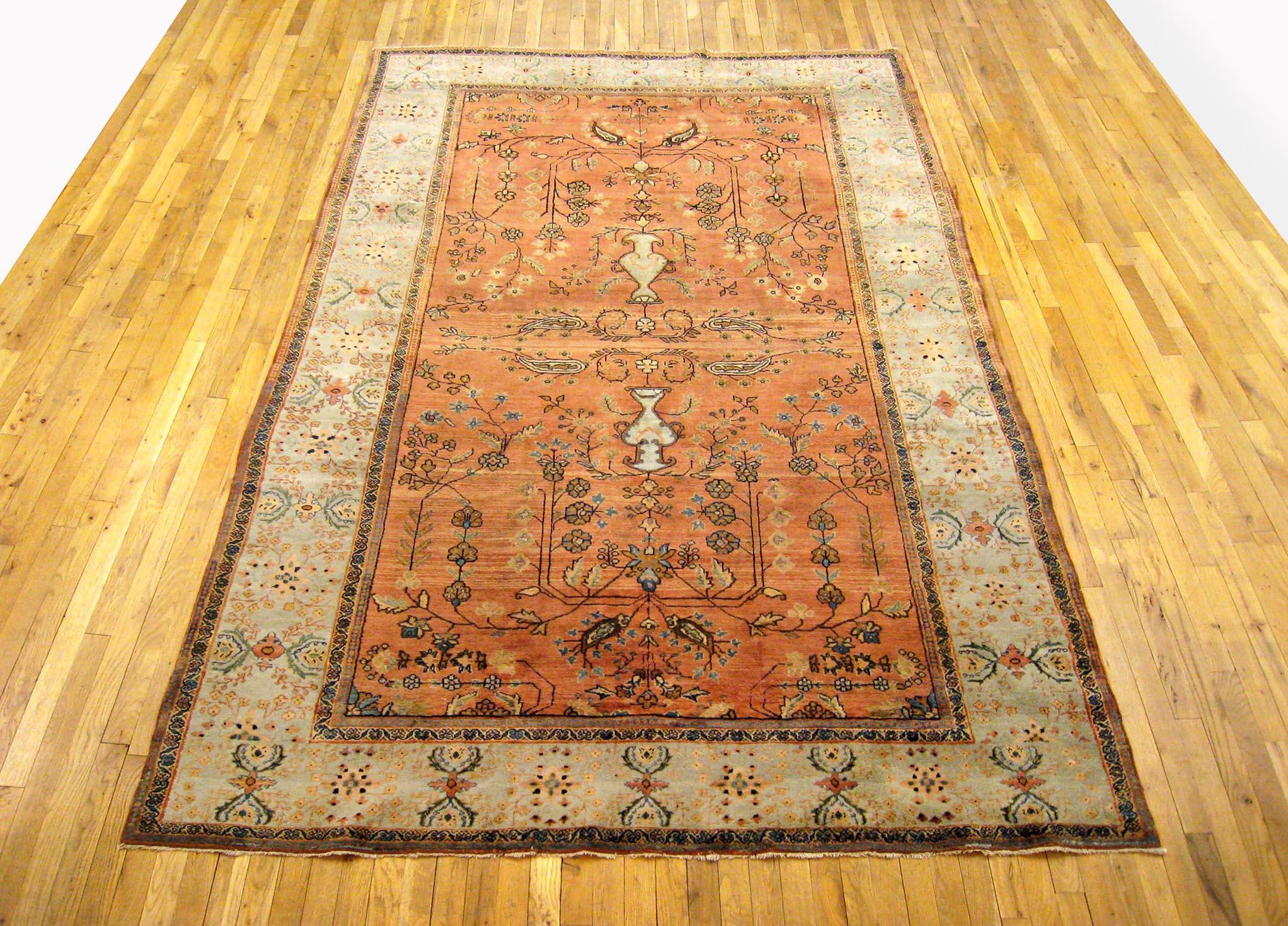 Antique Ferahan Sarouk oriental rug, circa 1900, room size.

An antique Ferahan Sarouk oriental rug, size 10'4