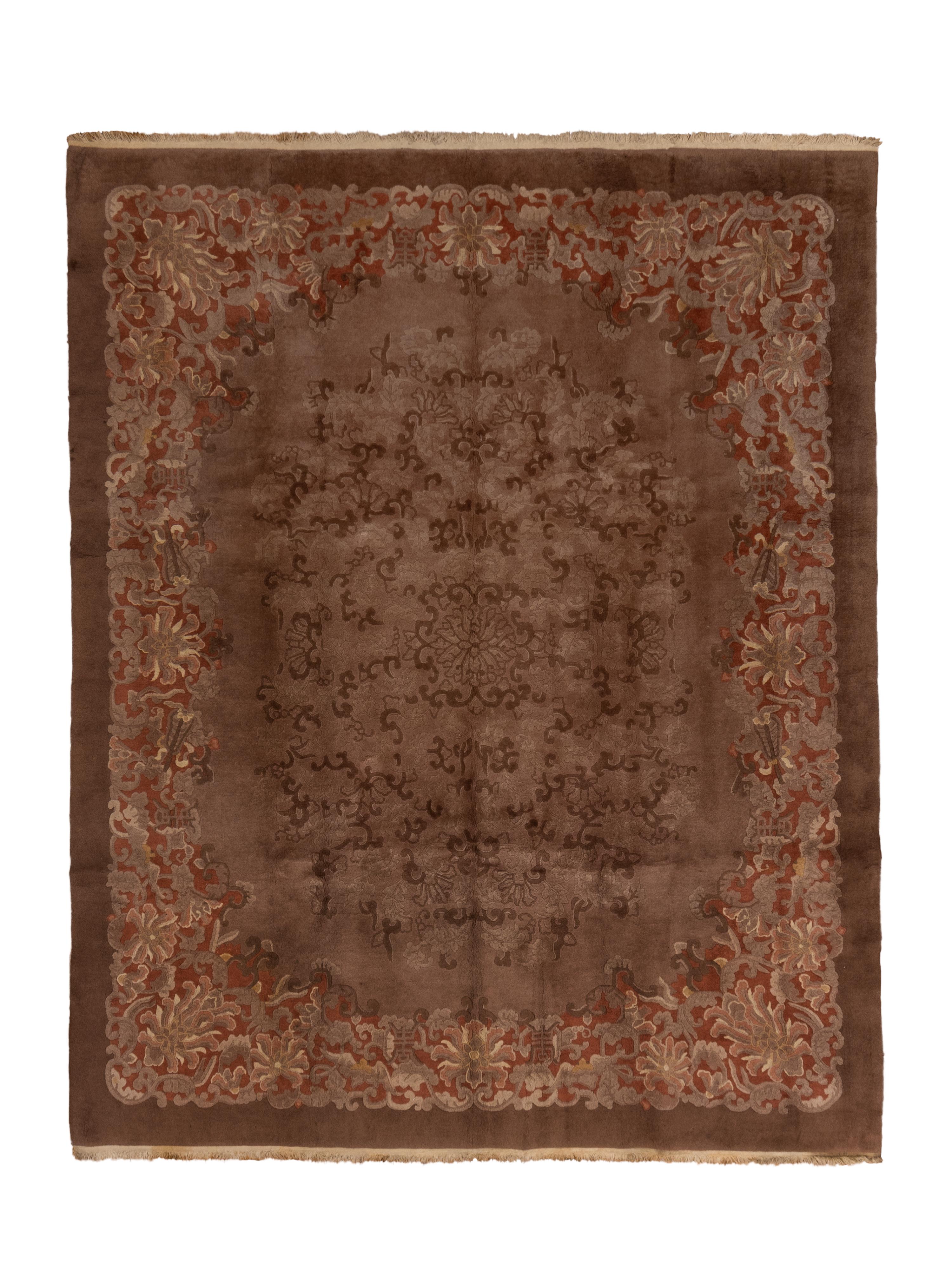 Fette carpets are, as here, usually tone-on-tone, with dense medallions and borders. Often, they show black accents to better organize the ebullient floral and leaf density. The border here is even more thick with lotus palmettes, surging foliage