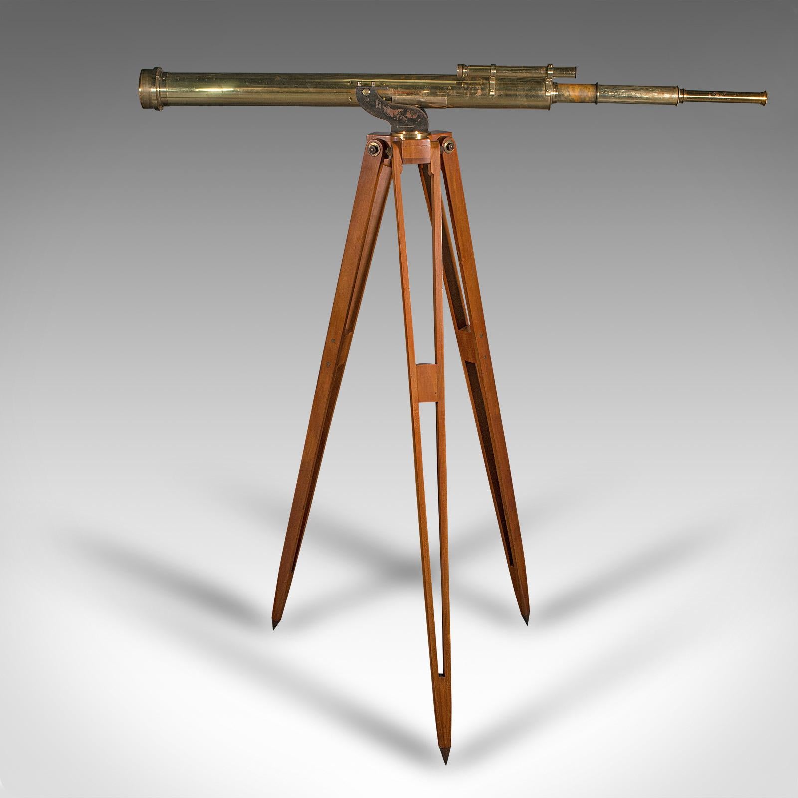 
This is an antique field telescope. An English, brass terrestrial and astronomical 'Starboy' tripod mounted refractor by Broadhurst, Clarkson & Co, dating to the early 20th century, circa 1920.

Perfect for bird watching, landscape appreciation,