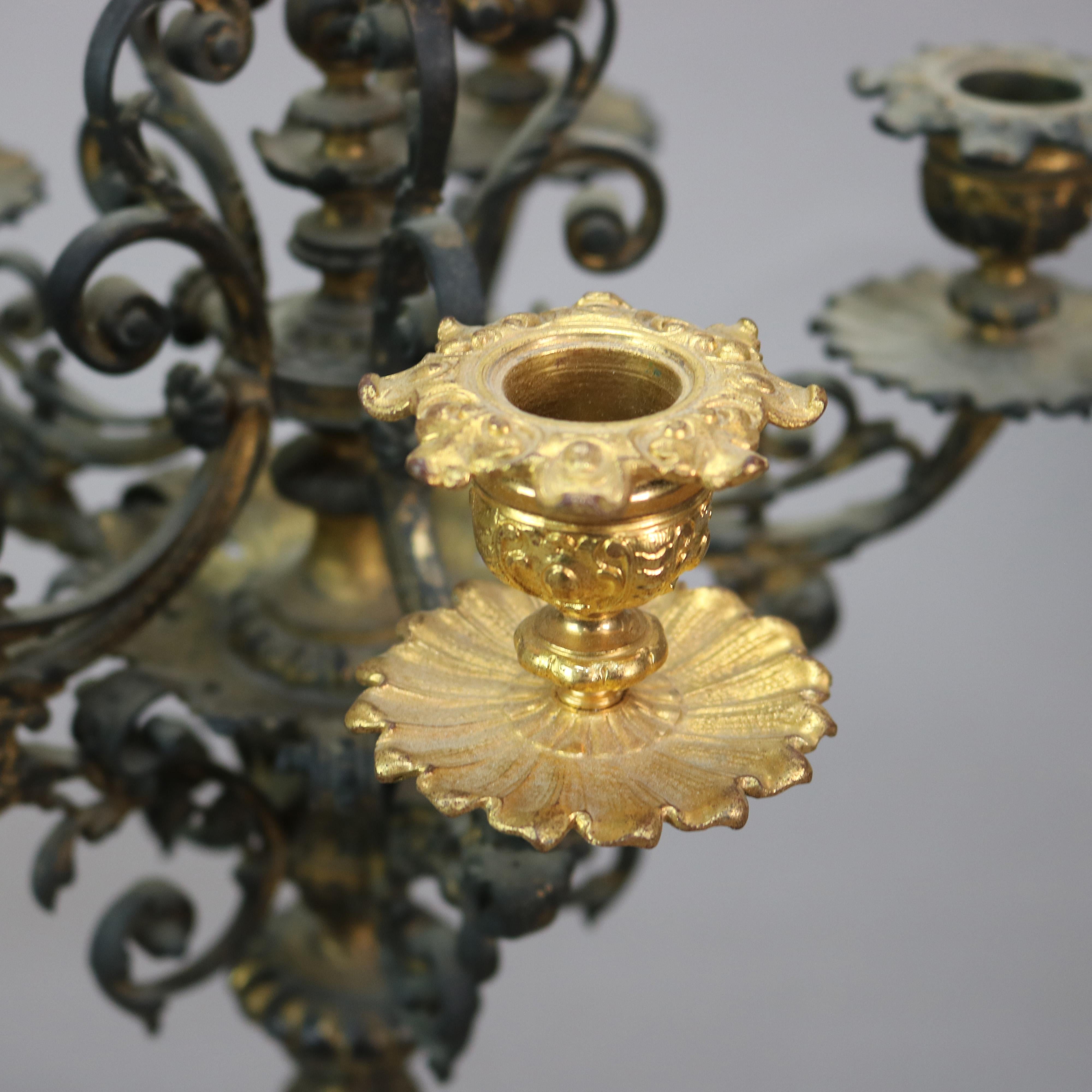 Pair Antique Figural Bronze & Gilt Finish Six-Candle Wind God Candelabras C1890

Measures - 20 3/4h x 11 3/4 x 11 3/4w