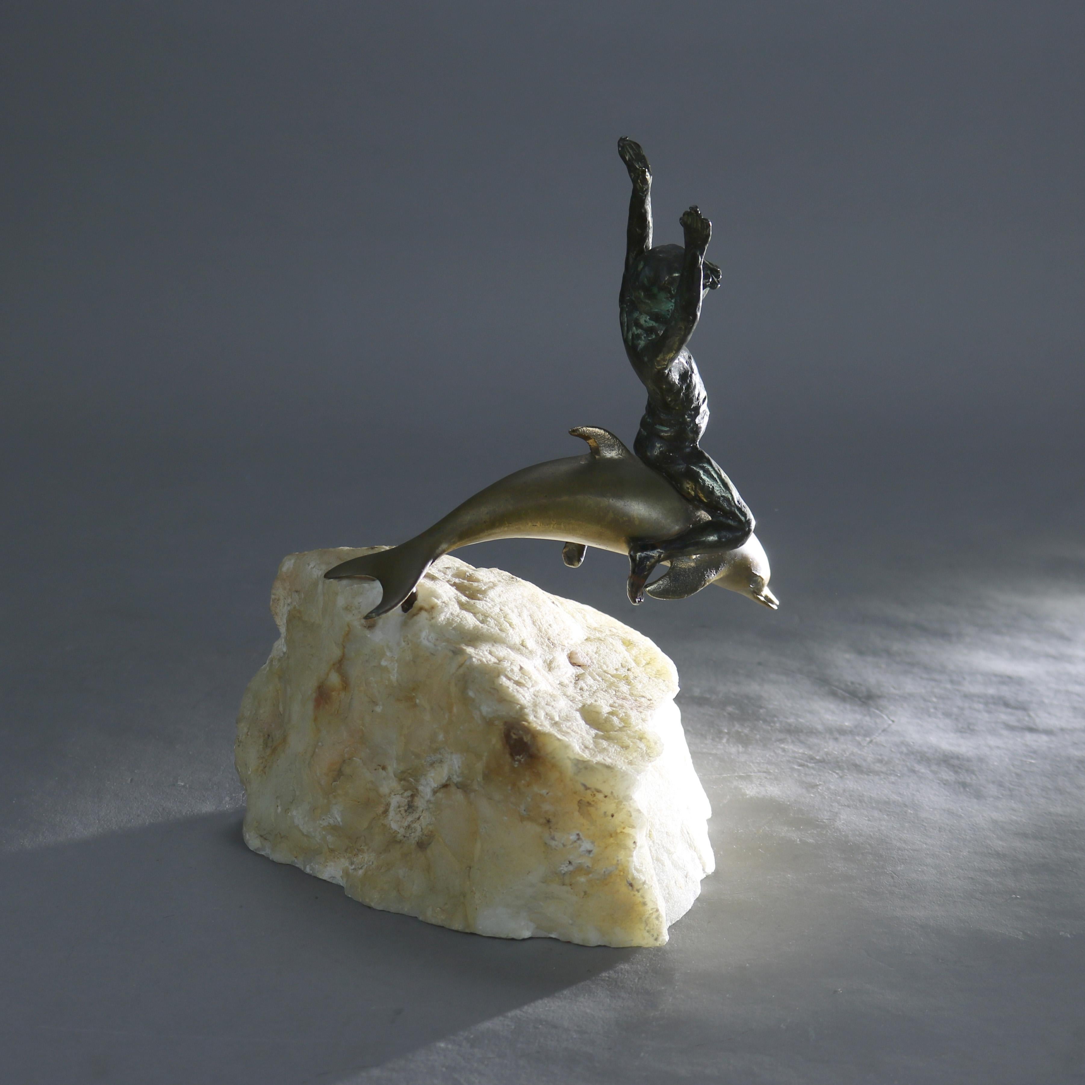 Antique Figural Bronze Sculpture of a Boy Riding a Dolphin with Marble or Stone Base C1900

Measures- 9.5