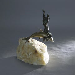 Antique Figural Bronze Sculpture of a Boy Riding a Dolphin C1900