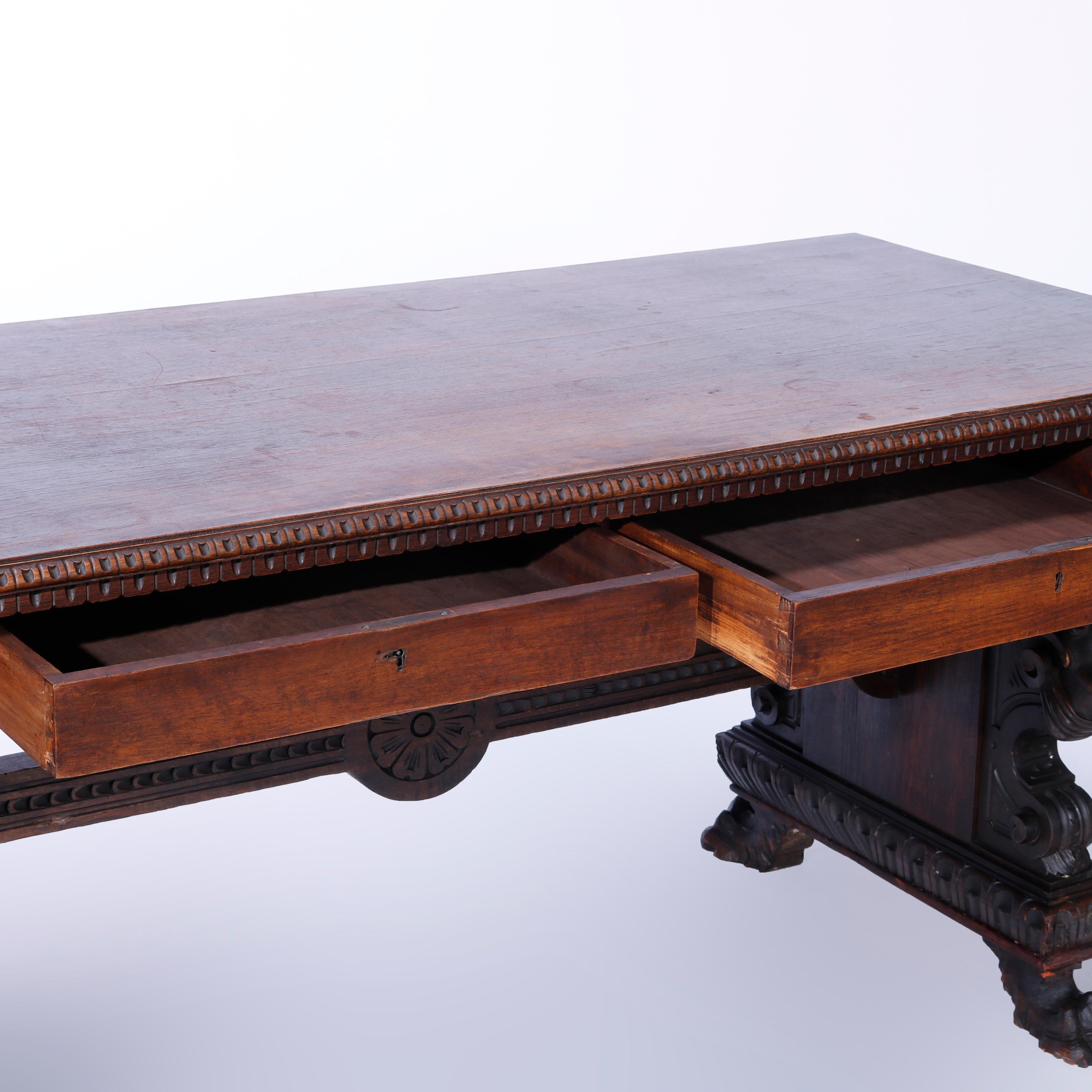Antique Figural Carved Walnut Claw Foot Trestle Library Table, circa 1900 1