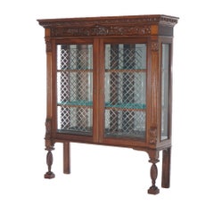 Antique Figural Carved Walnut Two Door Bookcase With Cut Glass Doors c1890