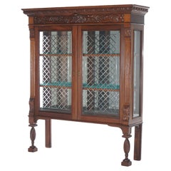 Antique Figural Carved Walnut Two Door Bookcase With Cut Glass Doors c1890