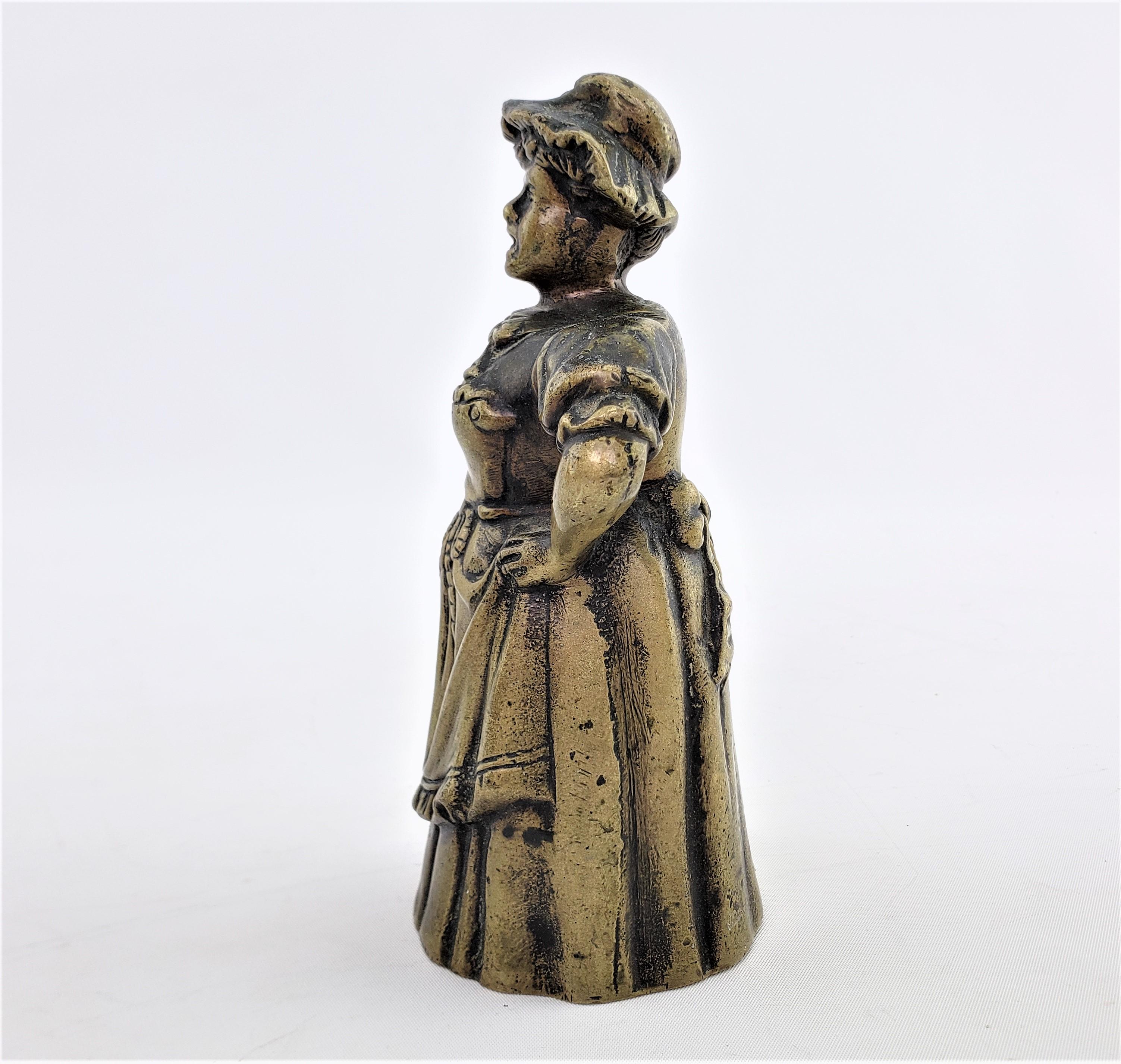 19th Century Antique Figural Cast Bronze Dinner Bell with Upset Woman & Shoed Leg Clapper For Sale
