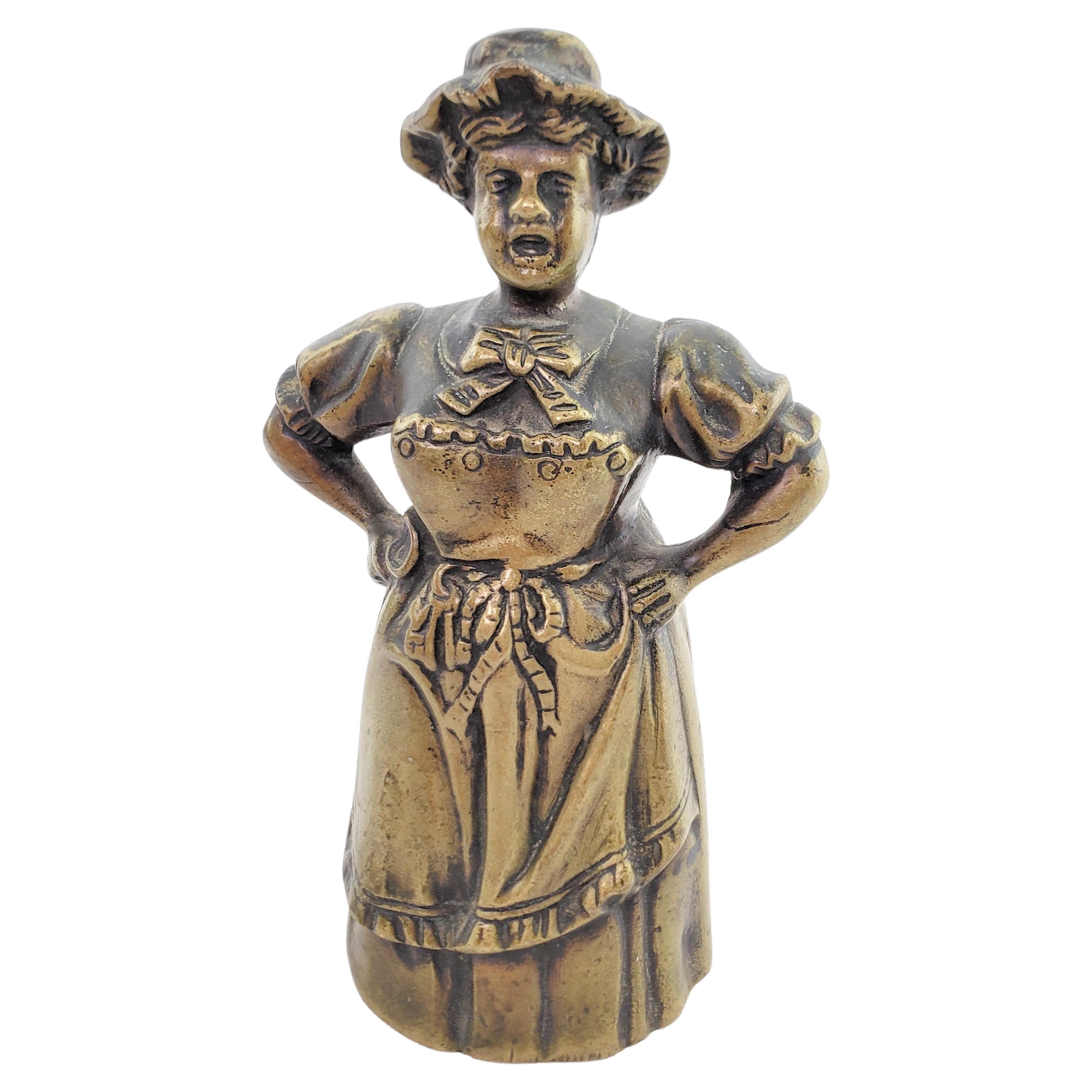 Antique Figural Cast Bronze Dinner Bell with Upset Woman & Shoed Leg Clapper For Sale