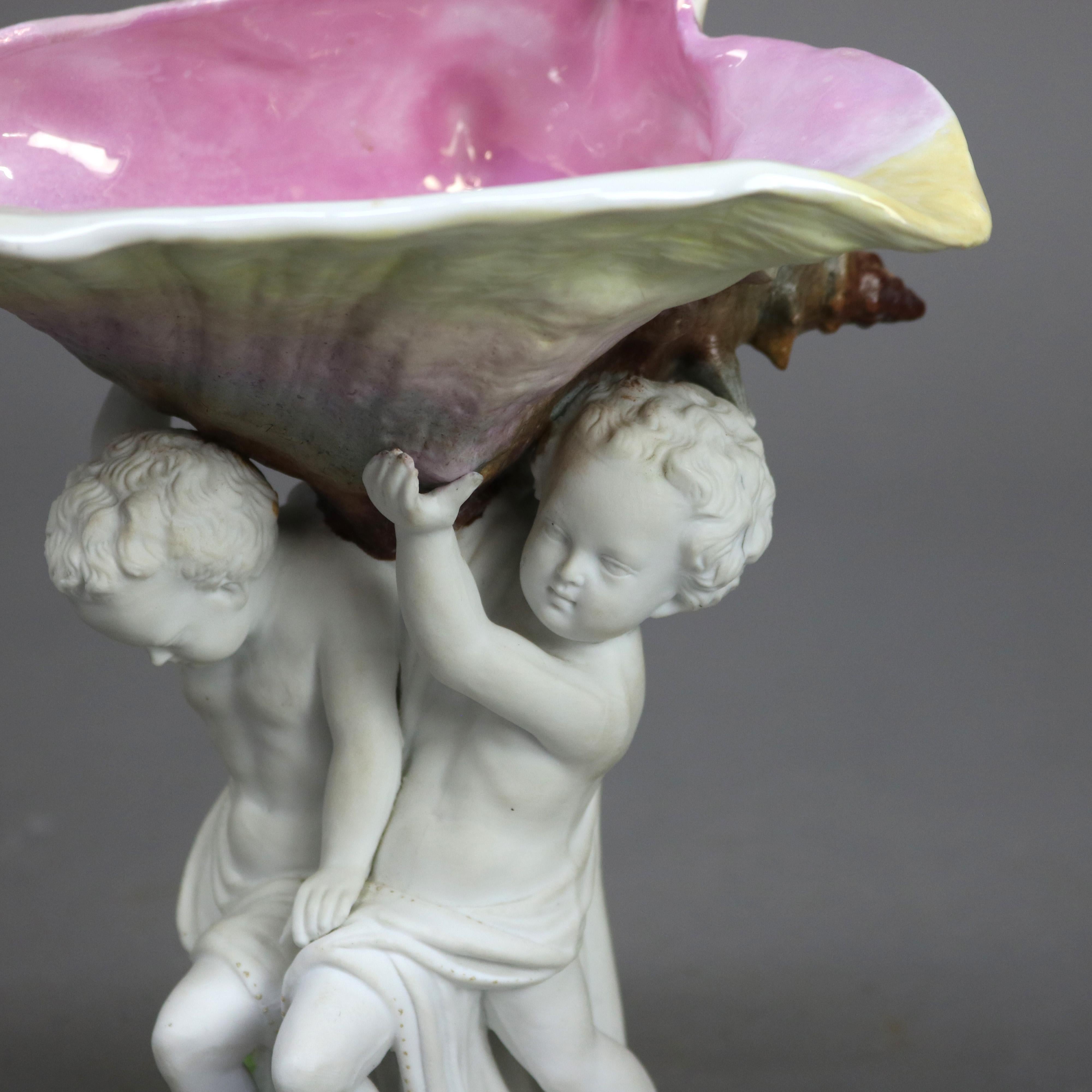 Compotier ancien en porcelaine biscuit avec chérubins et coquillages, vers 1890 en vente 1