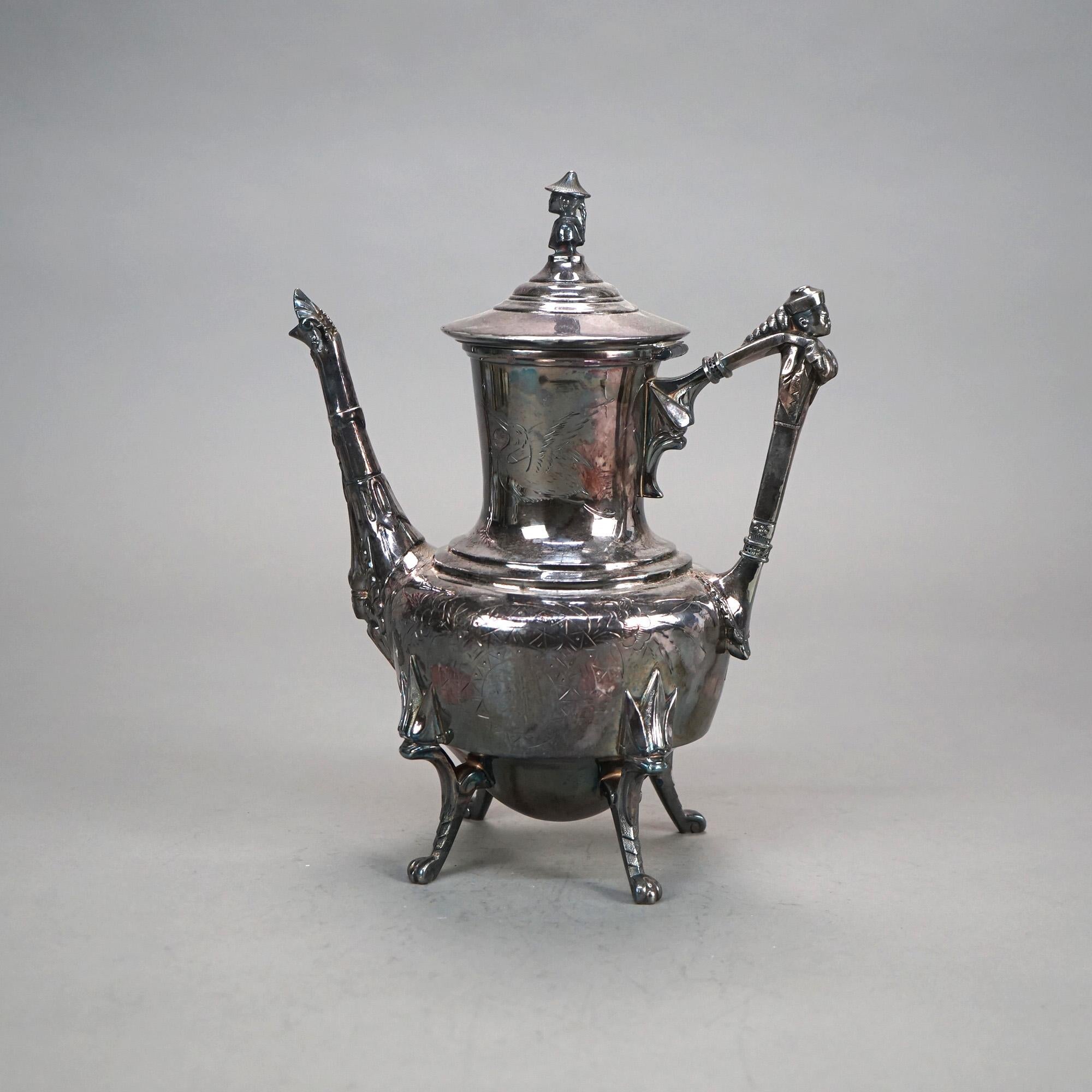 Théière ancienne en métal argenté avec gravure de feuillage C1890

Dimensions - 11,5 