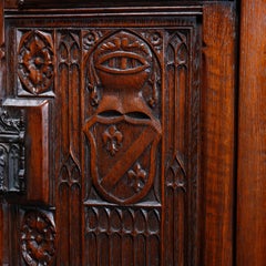 Antique Figural English Gothic Revival Carved Oak Court Cupboard, circa 1890