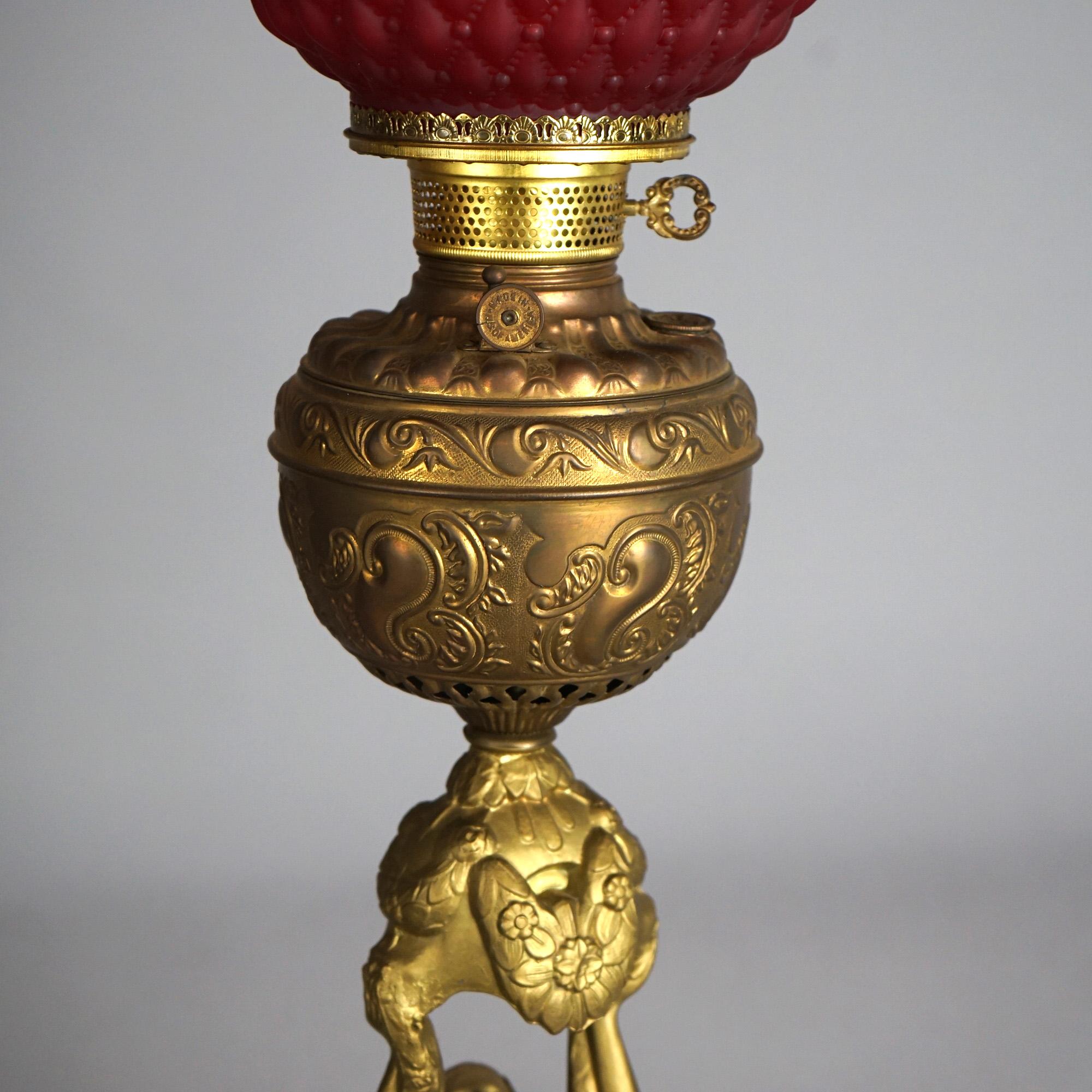 Antique Figural Gilt Metal Parlor Lamp with Quilted Red Glass Shade Circa 1900 For Sale 2