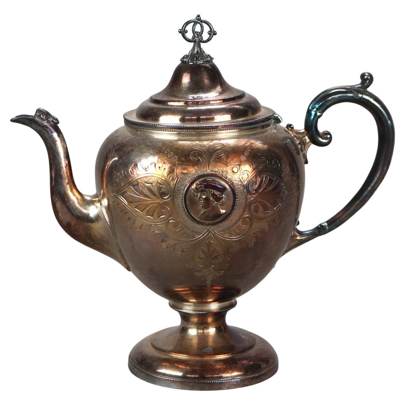 Antigua tetera figurada plateada C1890