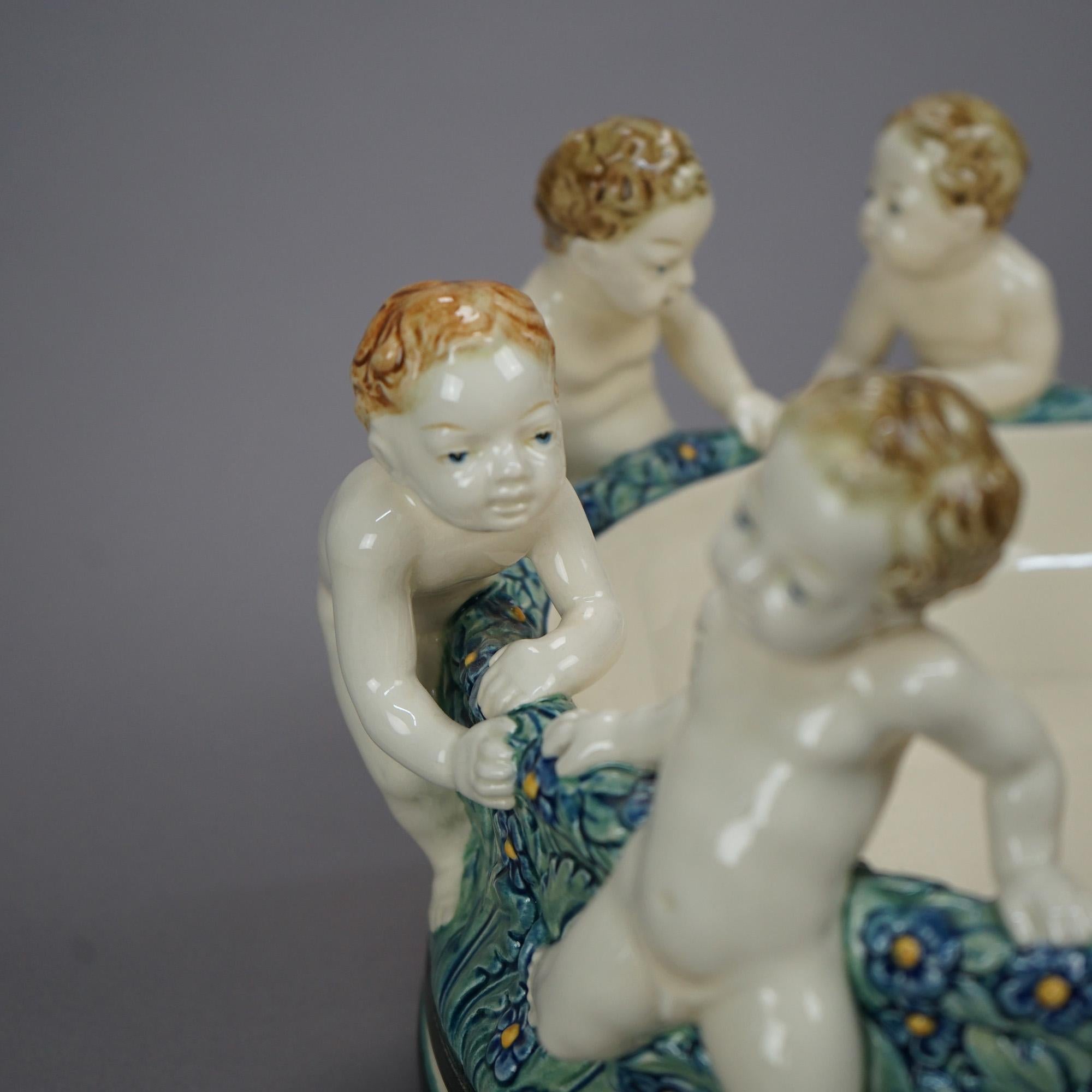 Glazed Antique Figural Wilhelm Majolica Pottery Center Bowl with Classical Putti, c1900