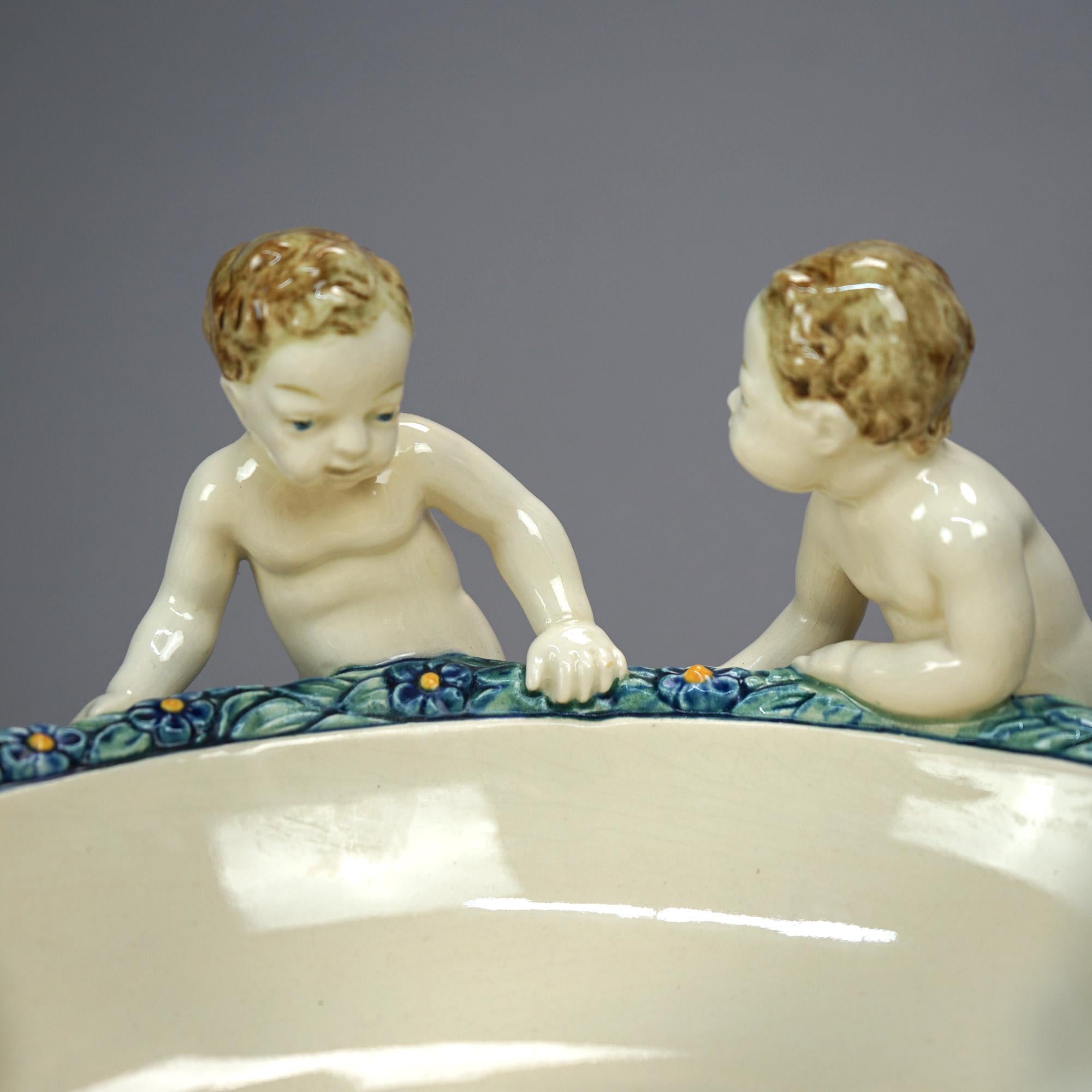 Antique Figural Wilhelm Majolica Pottery Center Bowl with Classical Putti, c1900 In Good Condition In Big Flats, NY