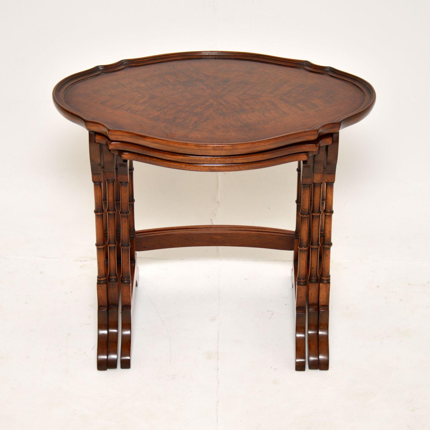 A wonderful antique walnut pie crust nest of tables. These were made in England, they date from around the 1900-1920 period.

They are of the utmost quality, the larger table has a pie crust top edge. All the tops have beautiful cross banded edges,