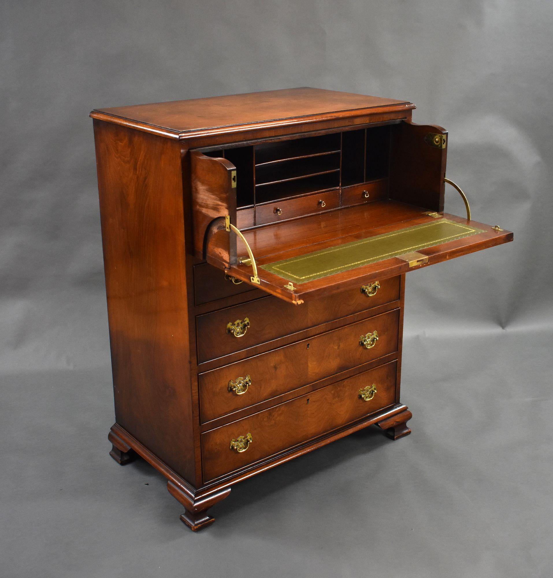 For sale is a good quality antique figured walnut secretaire chest of drawers, having a secretaire drawer to the top, opening to reveal a fitted interior and leather writing surface, above four graduated drawers, each with brass handles. The chest